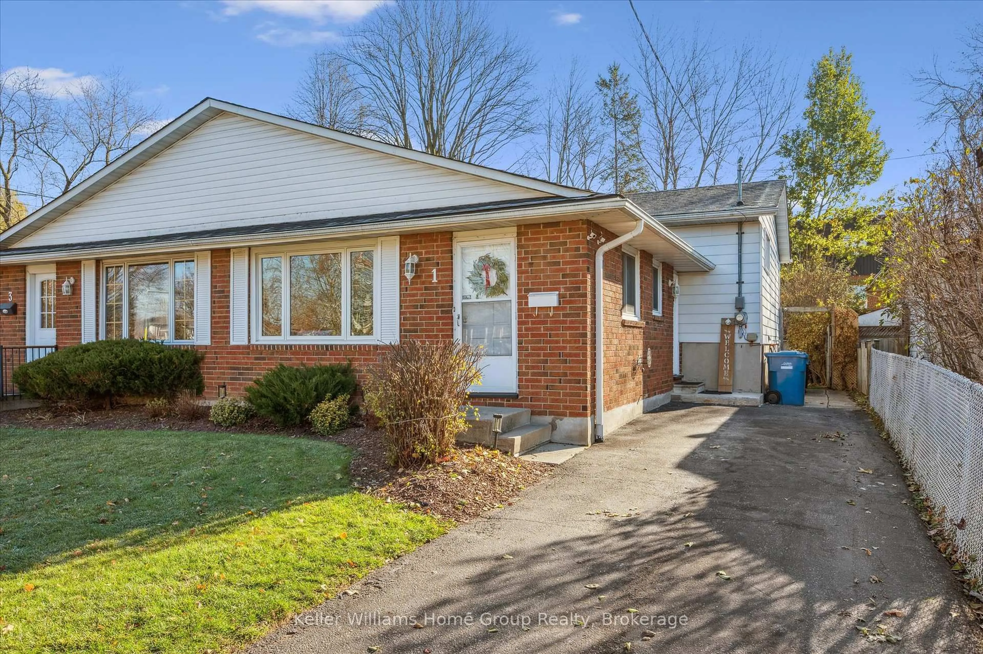 Home with brick exterior material, street for 1 Islington Ave, Guelph Ontario N1E 1B2