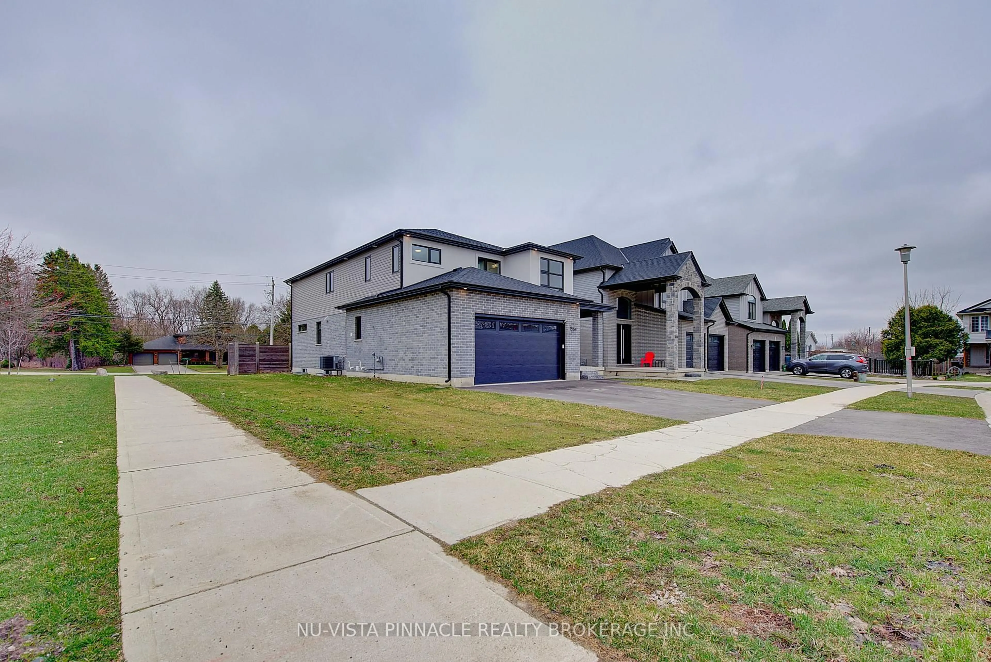 A pic from outside/outdoor area/front of a property/back of a property/a pic from drone, street for 1564 Benjamin Dr, London East Ontario N5V 5J5