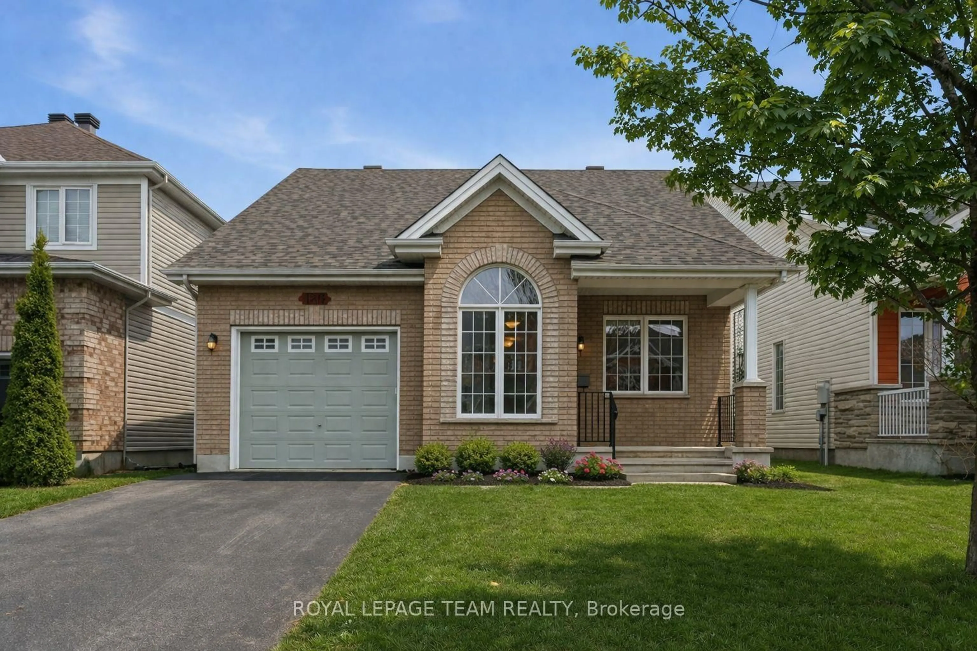 Home with vinyl exterior material, street for 145 Stedman St, Ottawa Ontario K1T 0B5