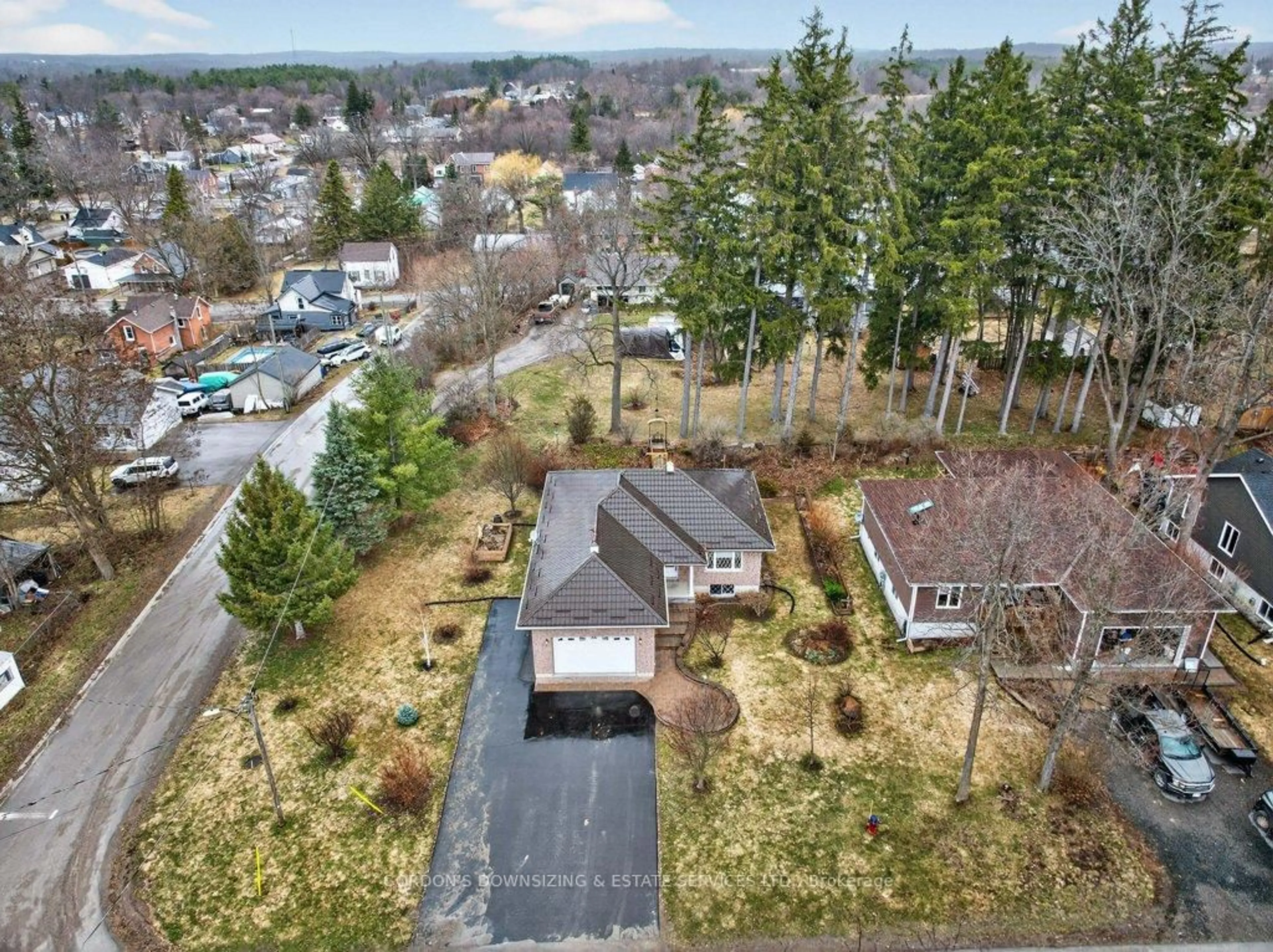 A pic from outside/outdoor area/front of a property/back of a property/a pic from drone, forest/trees view for 18 Mckenzie St, Centre Hastings Ontario L3Z 3E6