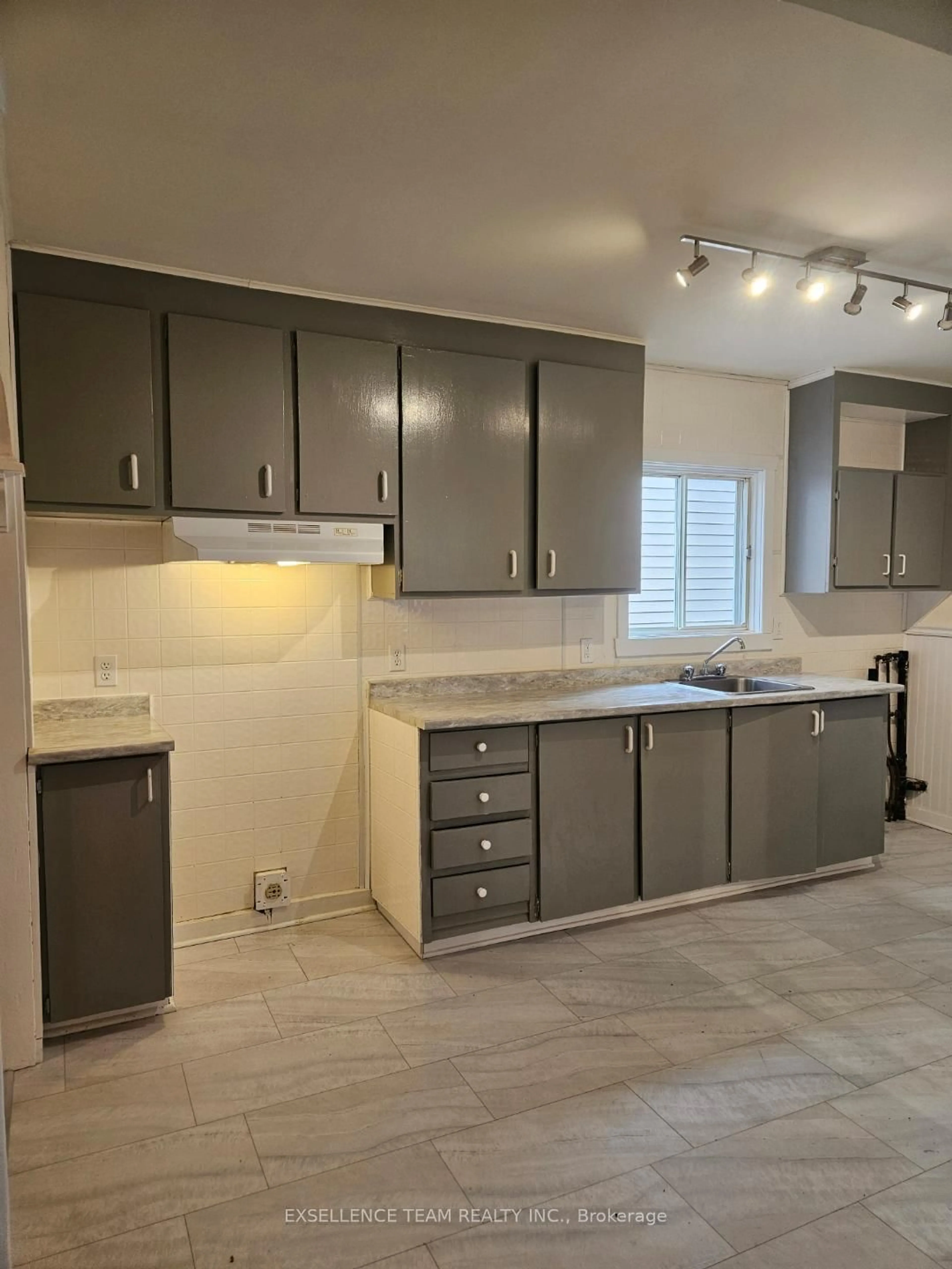 Open concept kitchen, ceramic/tile floor for 230-230A CARLETON St, Cornwall Ontario K6H 4X4