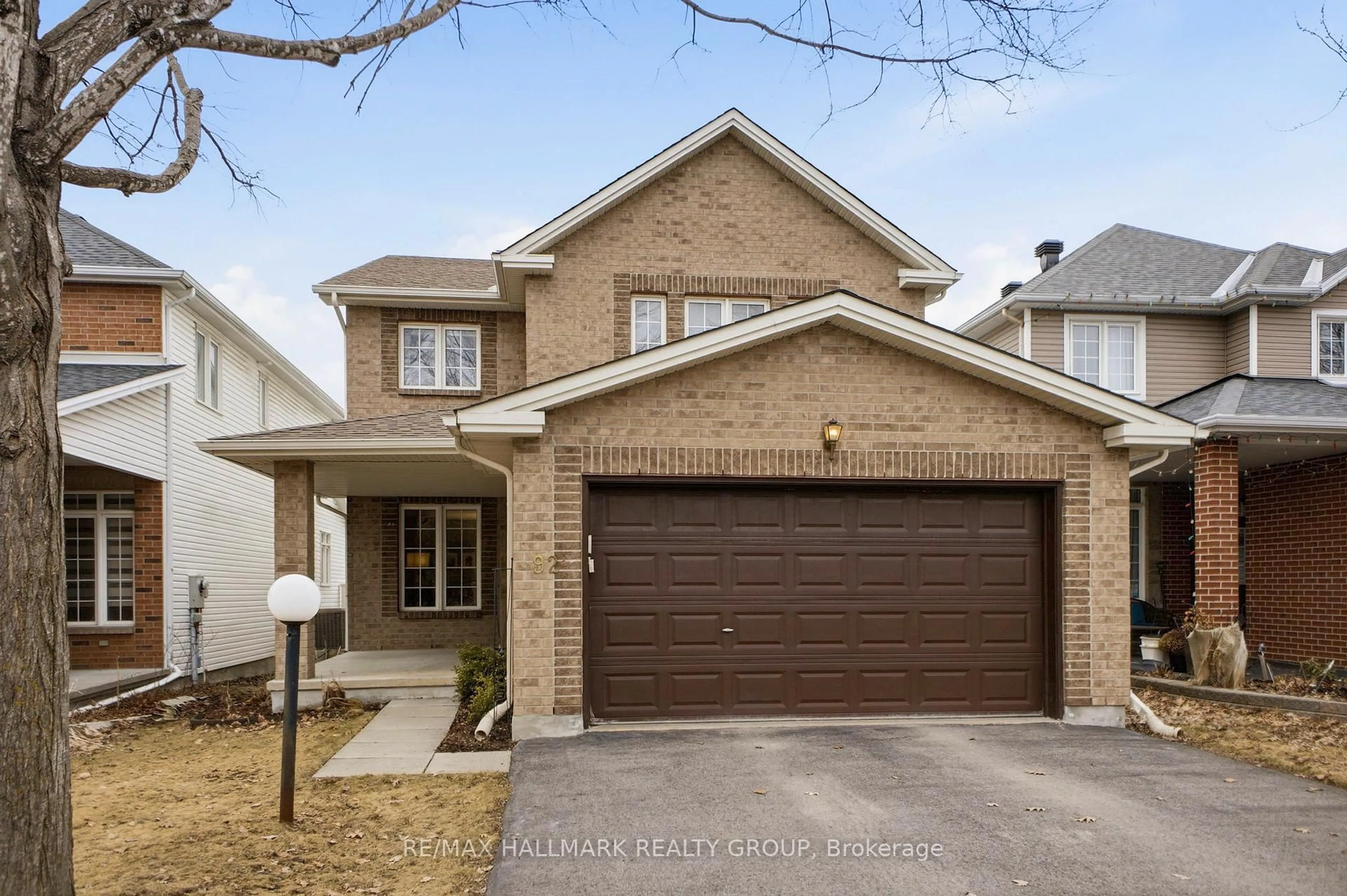 Home with brick exterior material, street for 92A Upney Dr, Nepean Ontario K2J 5H3