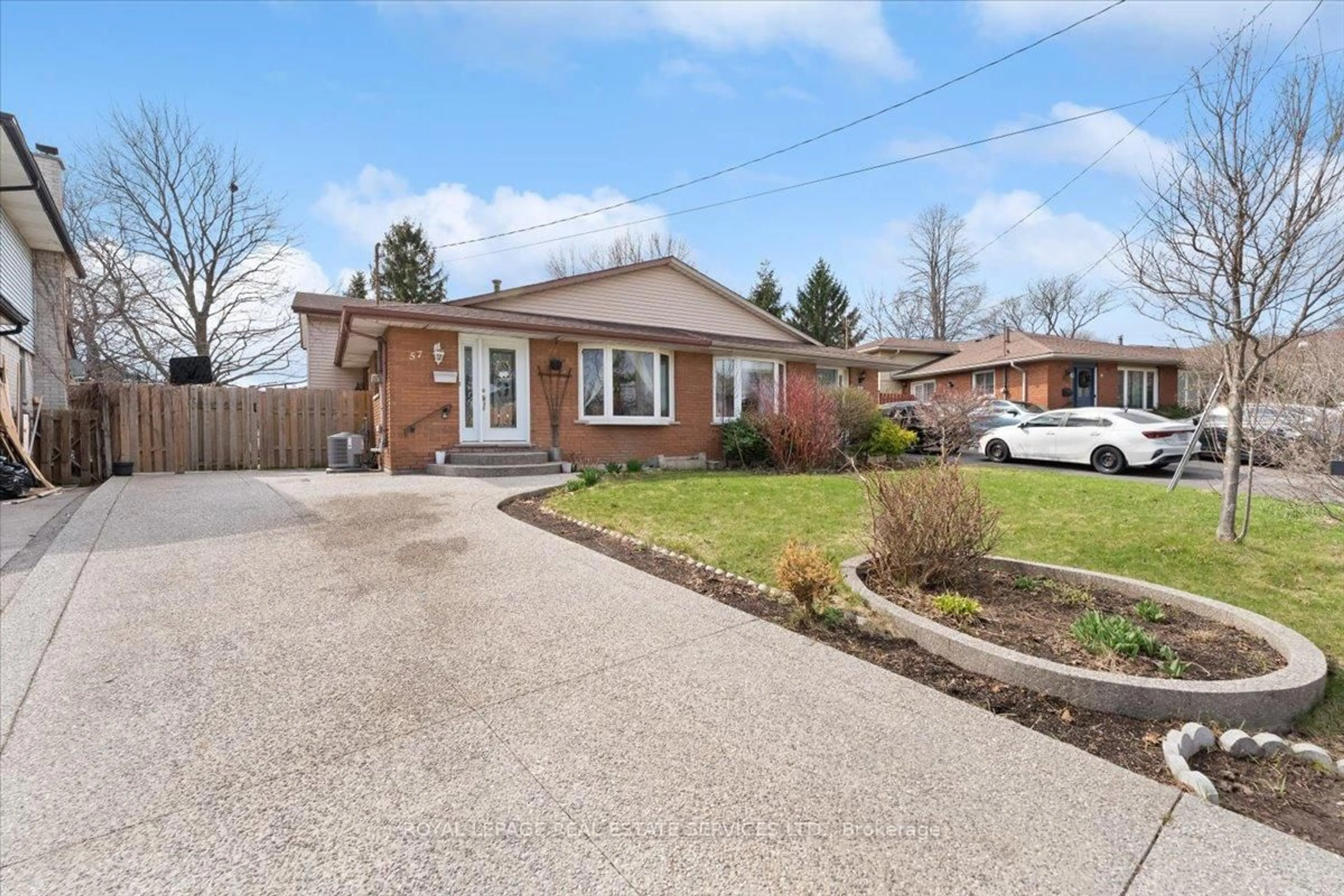 Home with brick exterior material, street for 57 Elora Dr, Hamilton Ontario L9C 6T4