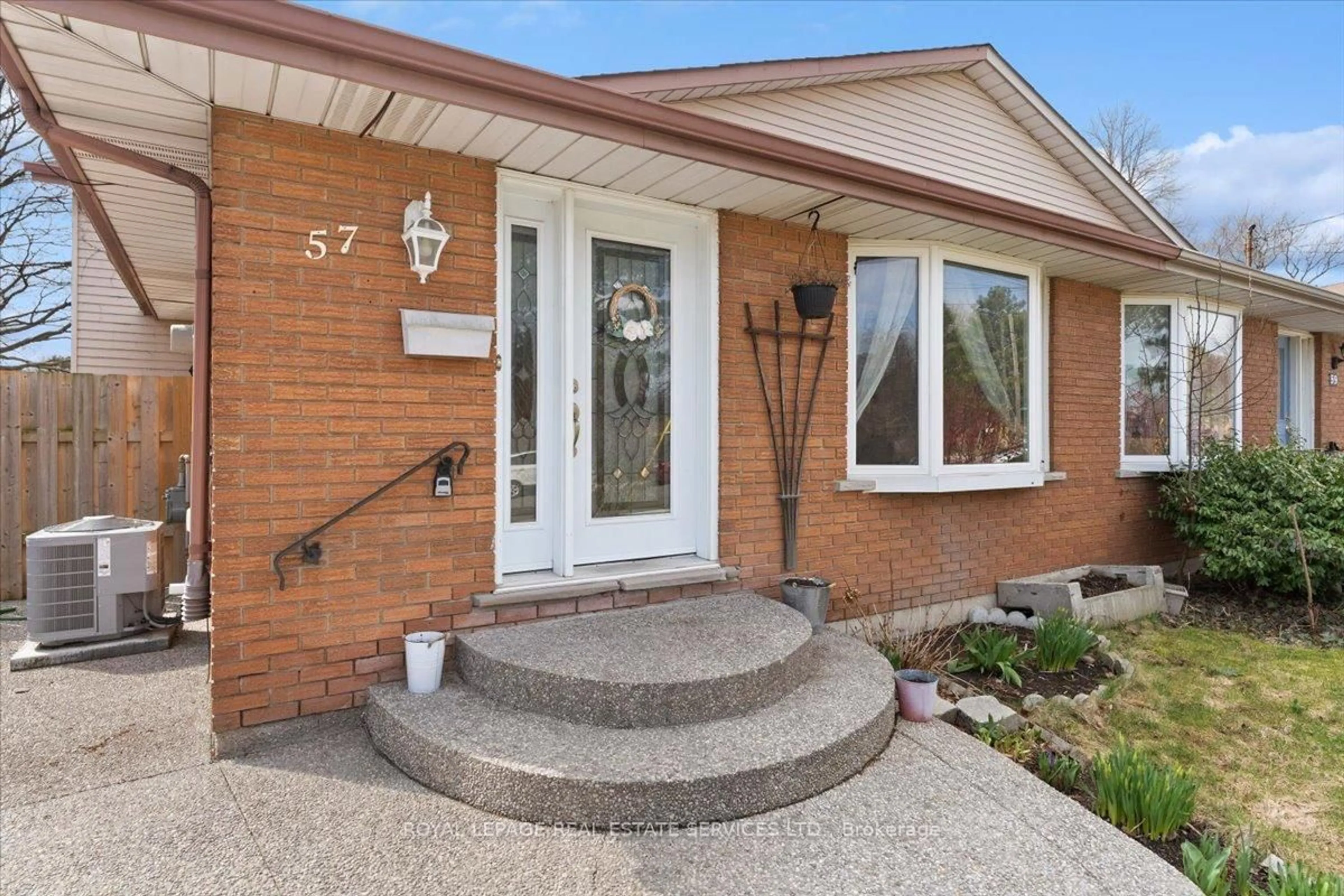 Home with brick exterior material, street for 57 Elora Dr, Hamilton Ontario L9C 6T4