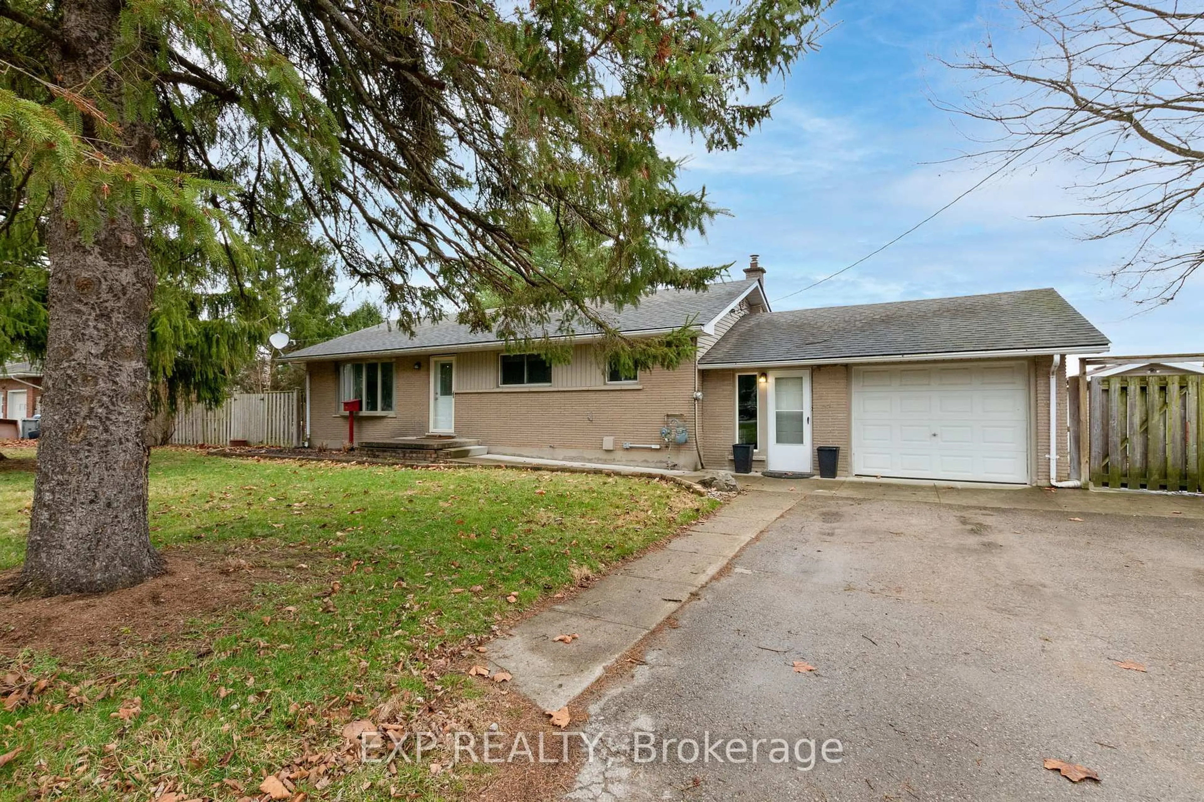 A pic from outside/outdoor area/front of a property/back of a property/a pic from drone, street for 9347 Longwoods Rd, Middlesex Centre Ontario N0L 1E0