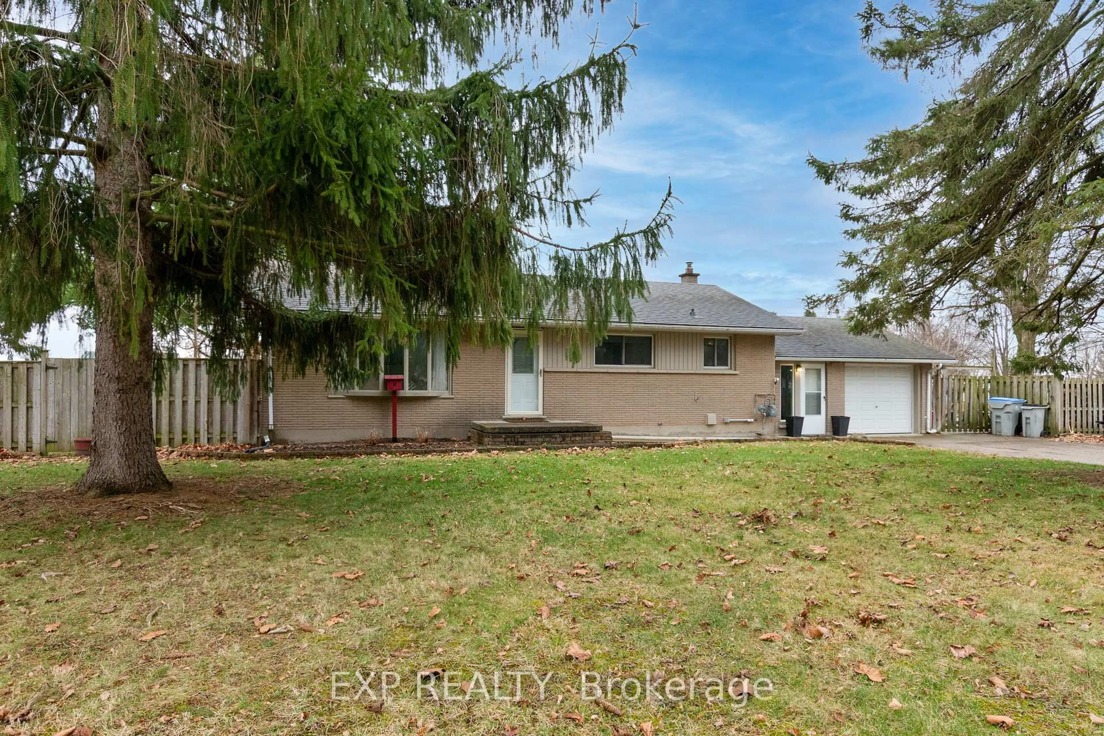 A pic from outside/outdoor area/front of a property/back of a property/a pic from drone, street for 9347 Longwoods Rd, Middlesex Centre Ontario N0L 1E0