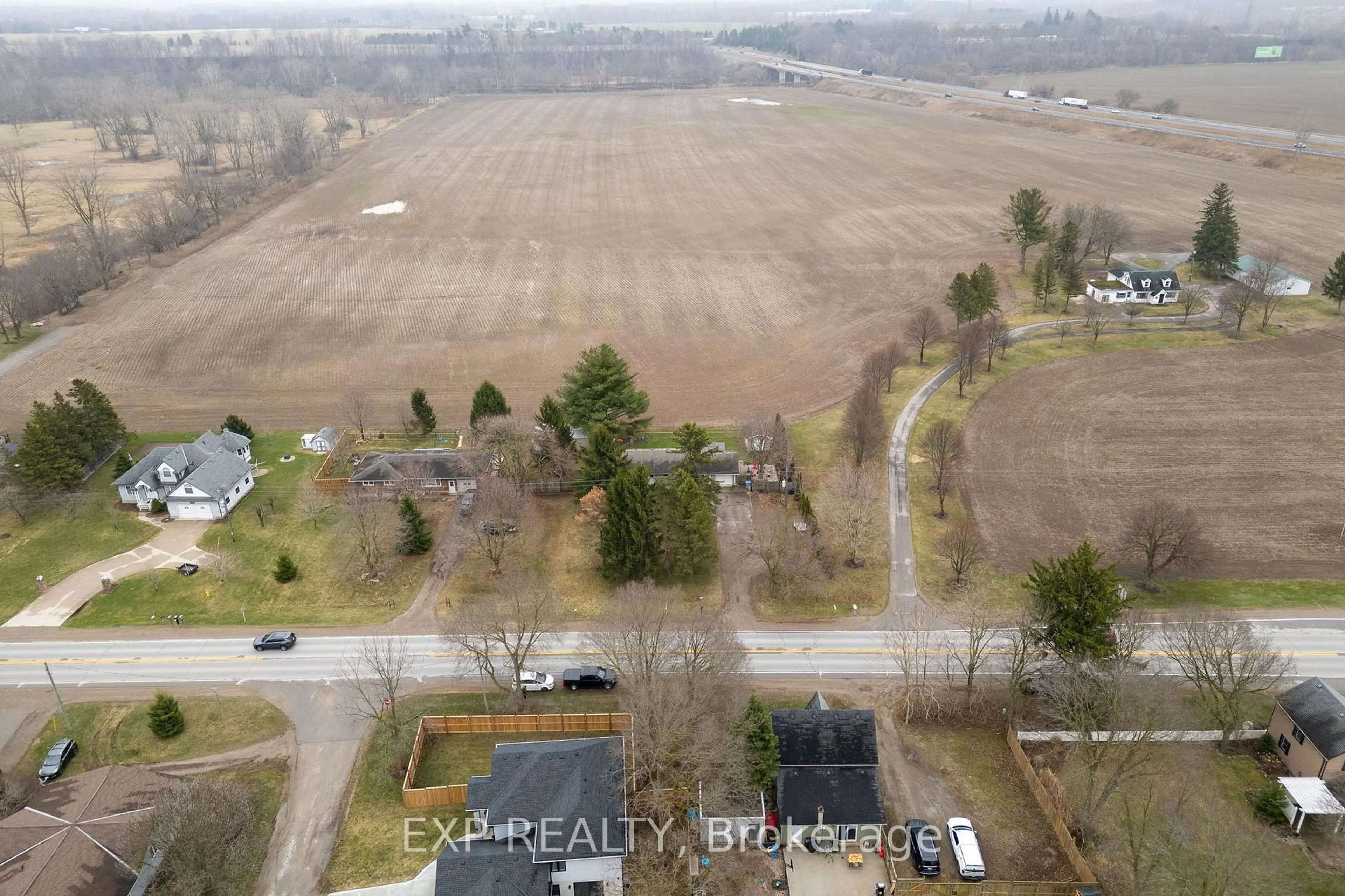 A pic from outside/outdoor area/front of a property/back of a property/a pic from drone, unknown for 9347 Longwoods Rd, Middlesex Centre Ontario N0L 1E0