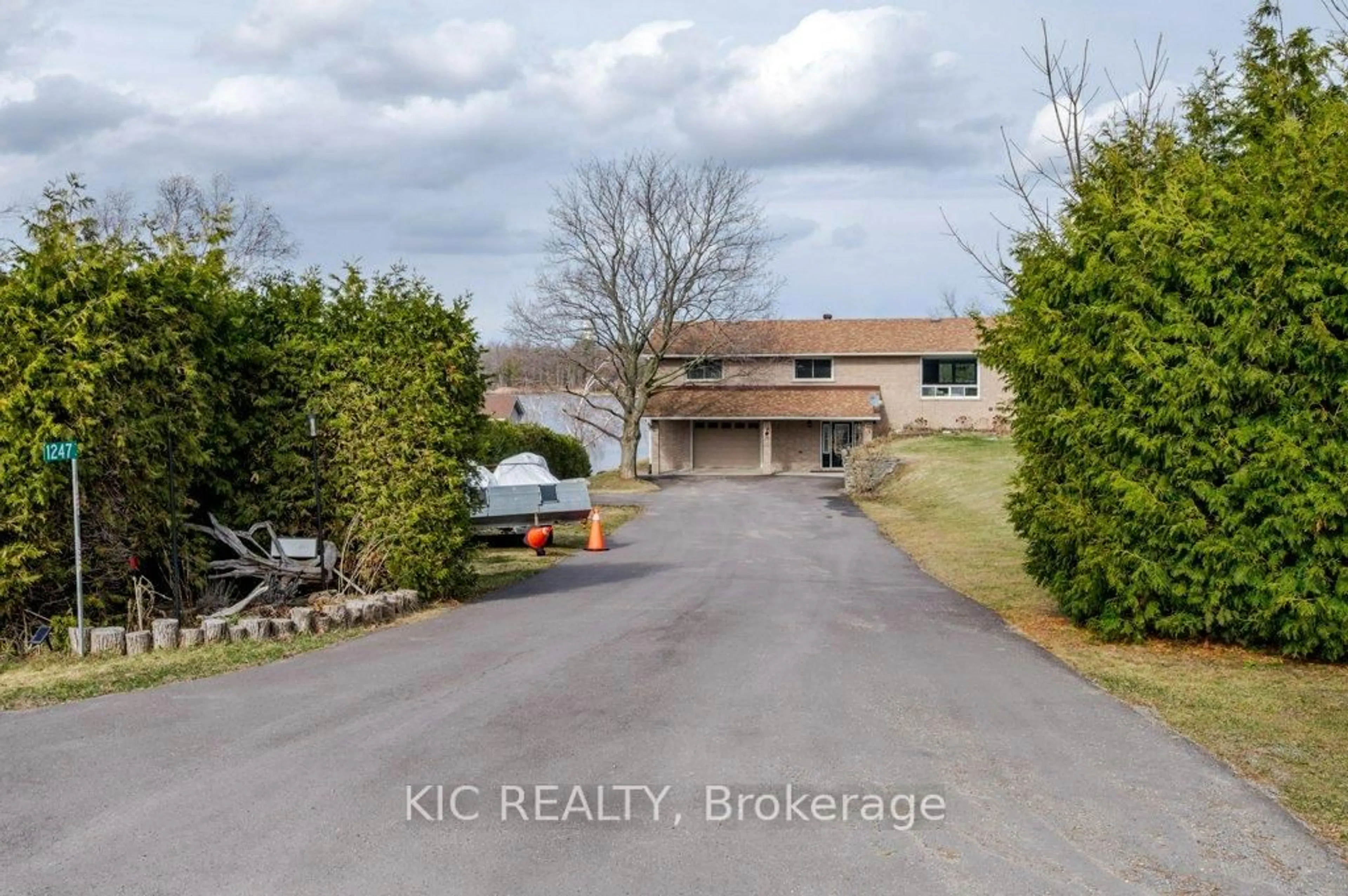 A pic from outside/outdoor area/front of a property/back of a property/a pic from drone, water/lake/river/ocean view for 1247 Gail Park Dr, Selwyn Ontario K0L 1T0