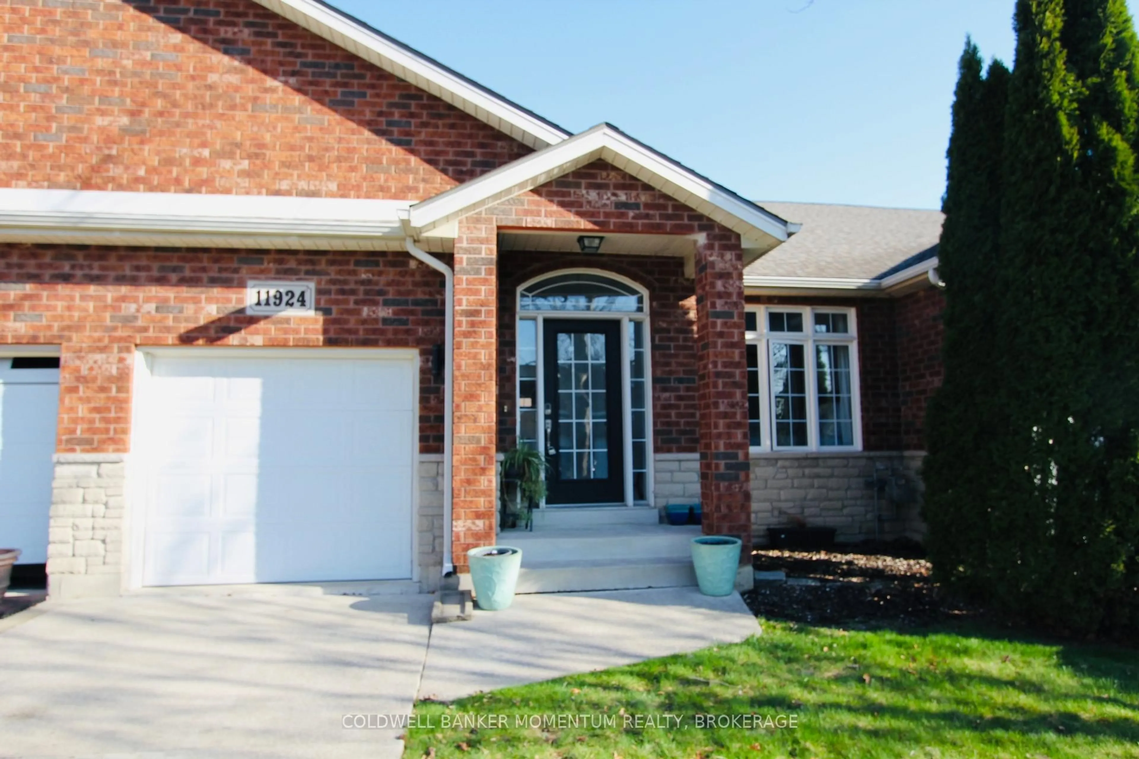 Home with brick exterior material, street for 11924 Cobblestone Cres, Windsor Ontario N8P 1T7