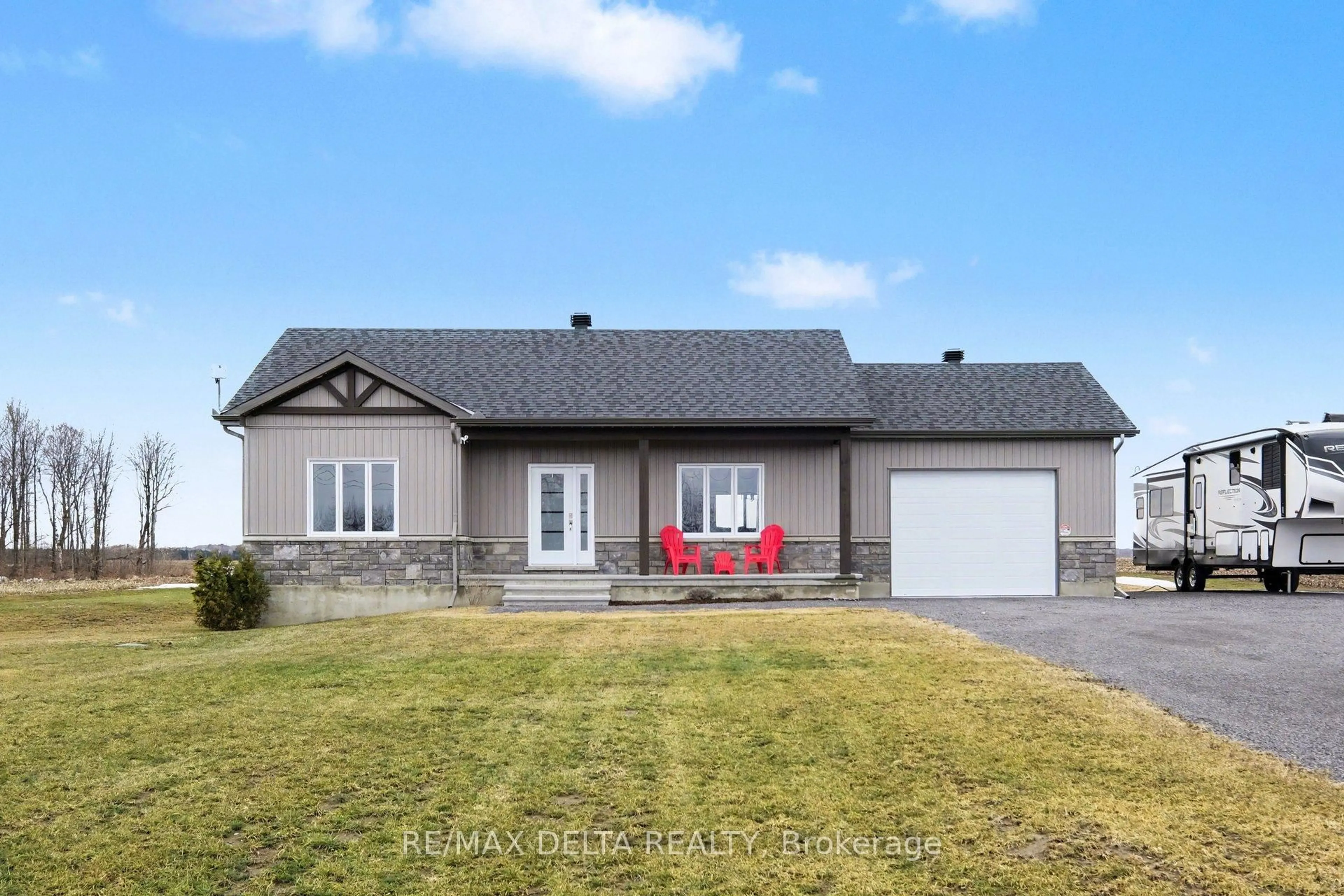 A pic from outside/outdoor area/front of a property/back of a property/a pic from drone, street for 121 County Rd 19 Rd, Alfred and Plantagenet Ontario K0A 3K0