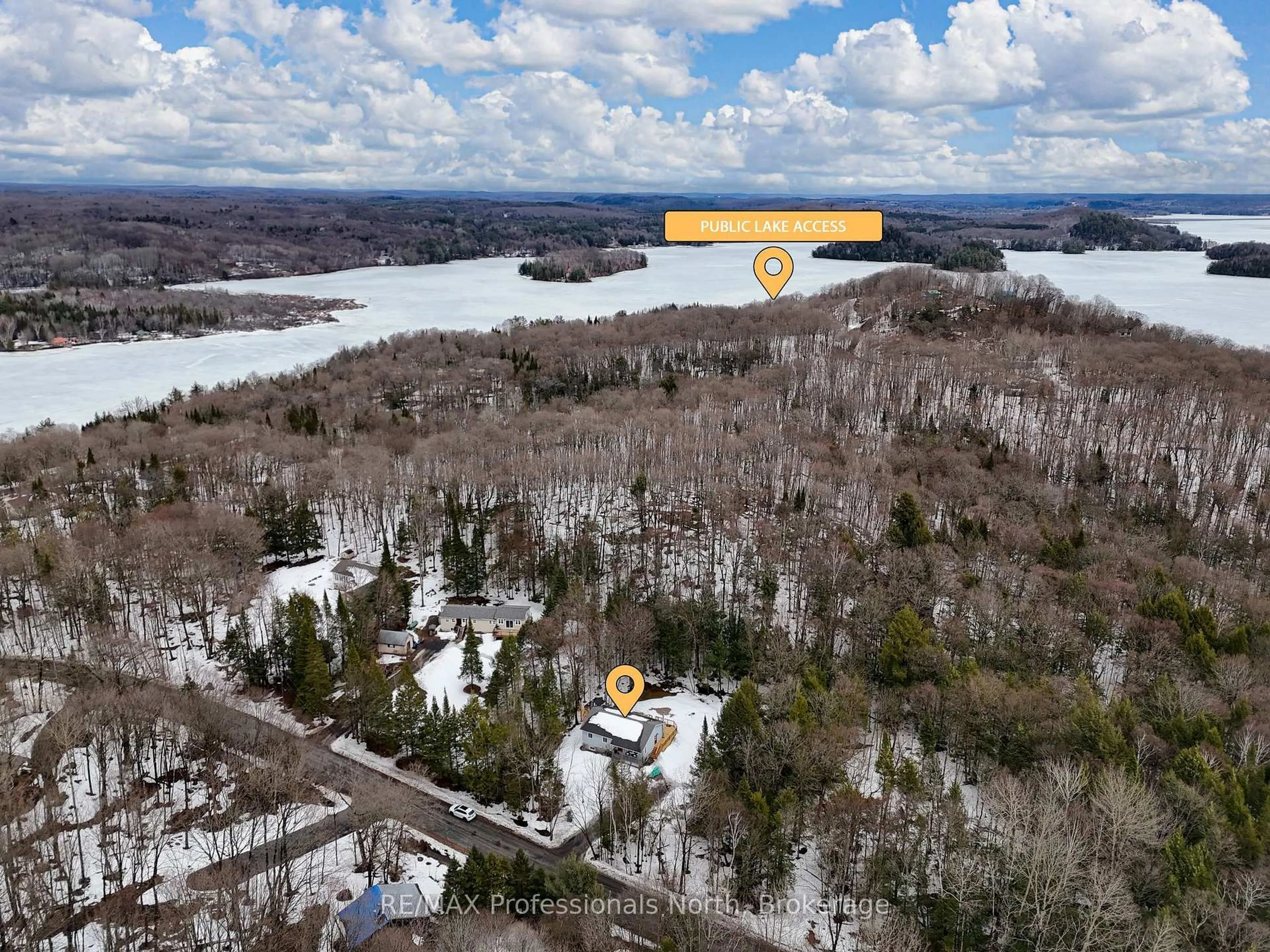 A pic from outside/outdoor area/front of a property/back of a property/a pic from drone, water/lake/river/ocean view for 99 Vernon Lane, Huntsville Ontario P1H 2J2