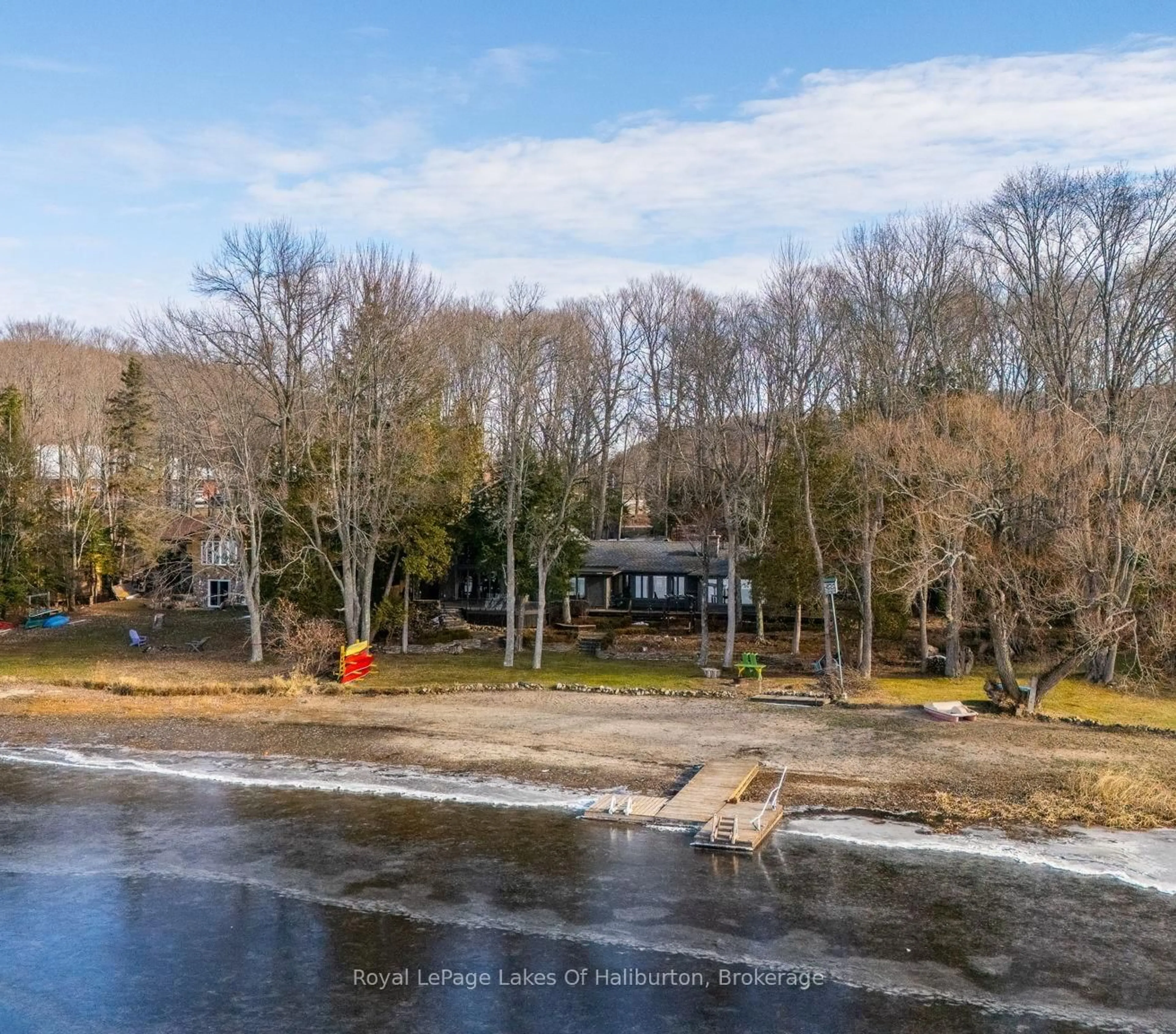 A pic from outside/outdoor area/front of a property/back of a property/a pic from drone, water/lake/river/ocean view for 1073 Grass Lake Rd, Dysart et al Ontario K0M 1S0