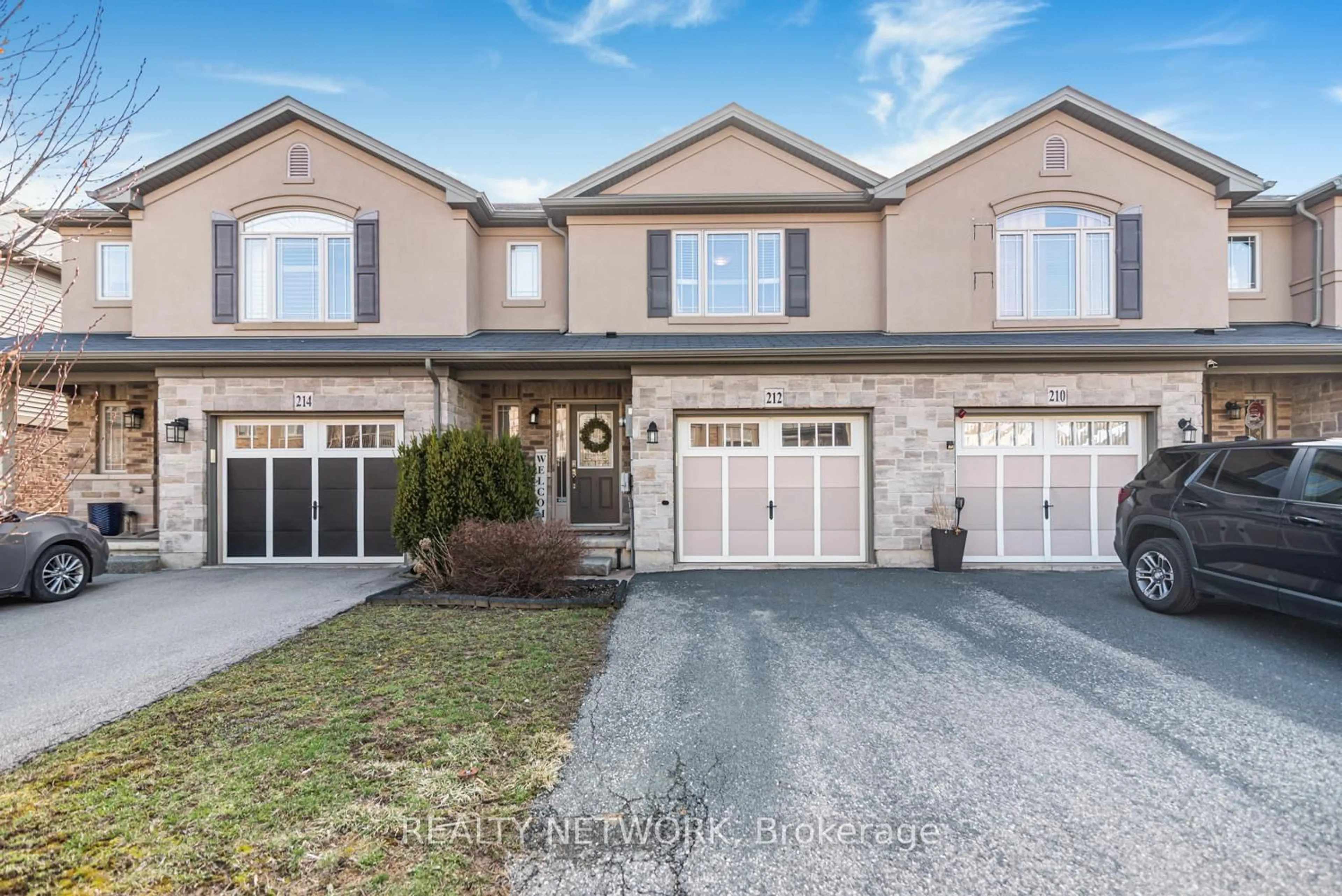 Home with brick exterior material, street for 212 Westbank Tr, Hamilton Ontario L8J 0G8