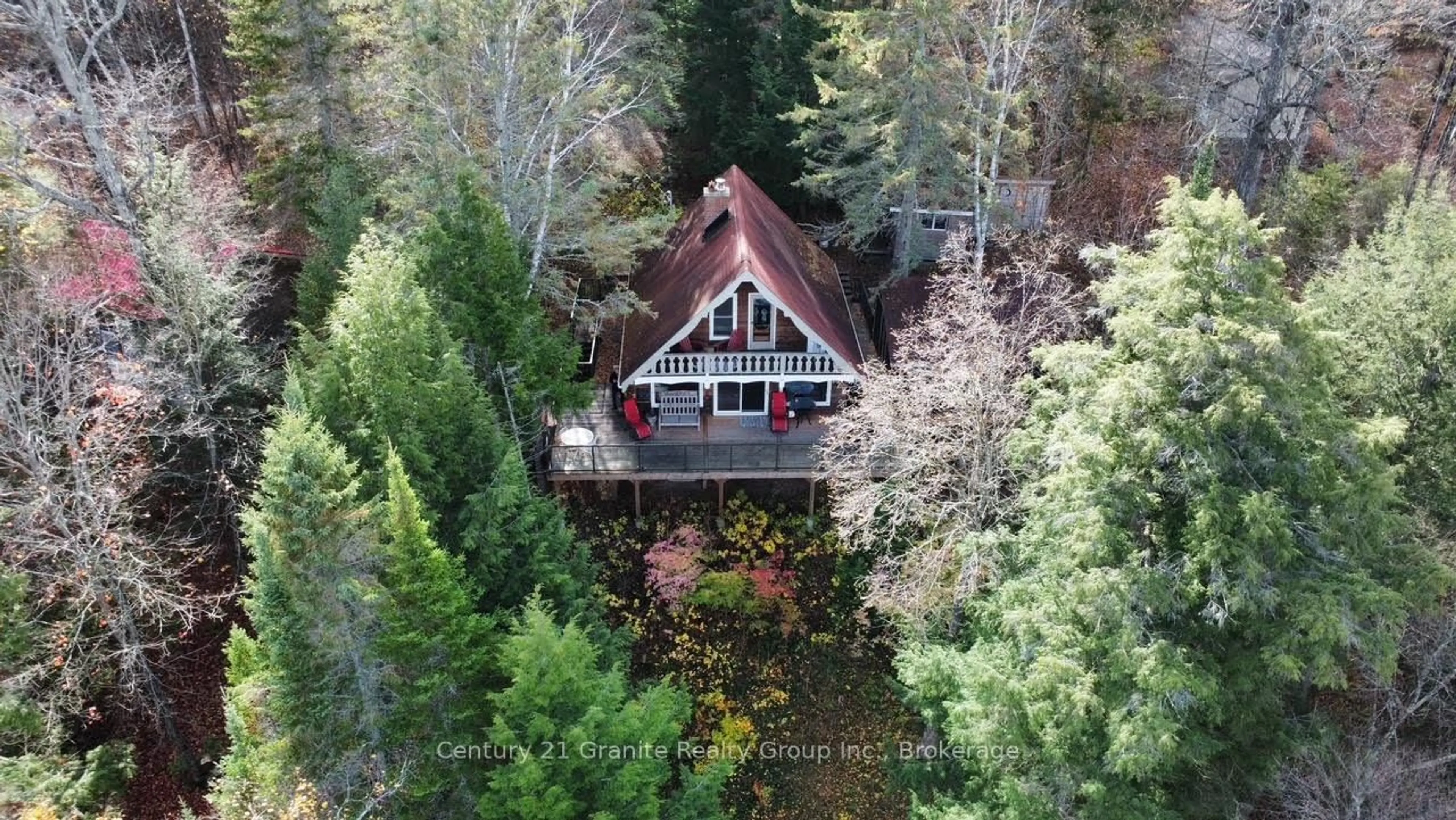 A pic from outside/outdoor area/front of a property/back of a property/a pic from drone, water/lake/river/ocean view for 1038 Broken Paddle Rd, Dysart et al Ontario K0M 1S0