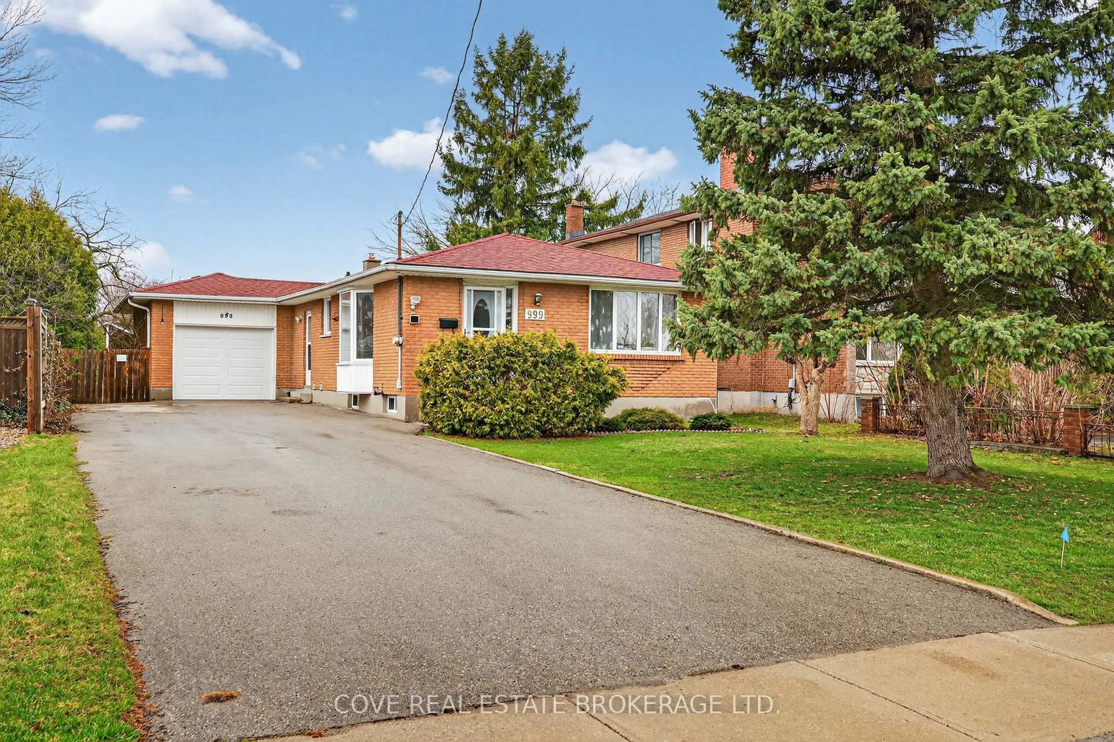 Home with brick exterior material, street for 999 Willow Dr, London South Ontario N6E 1P4