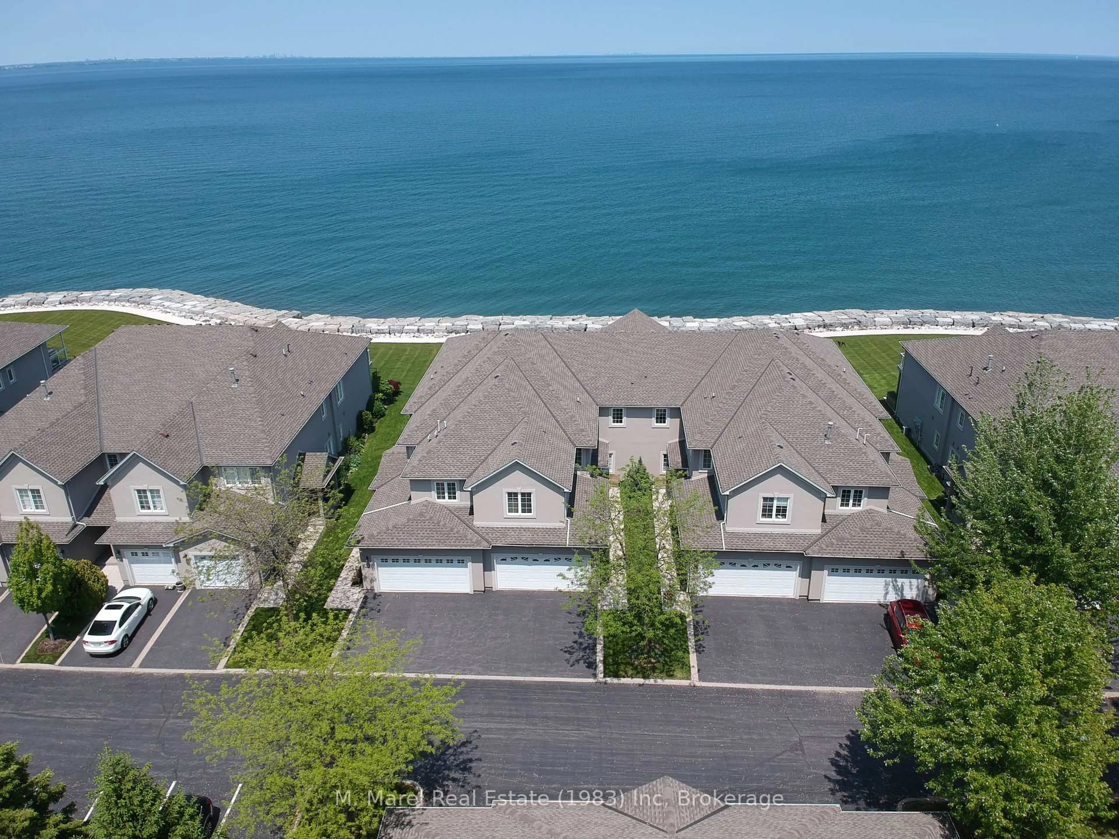 A pic from outside/outdoor area/front of a property/back of a property/a pic from drone, water/lake/river/ocean view for 484 Millen Rd #9, Hamilton Ontario L8E 6G4