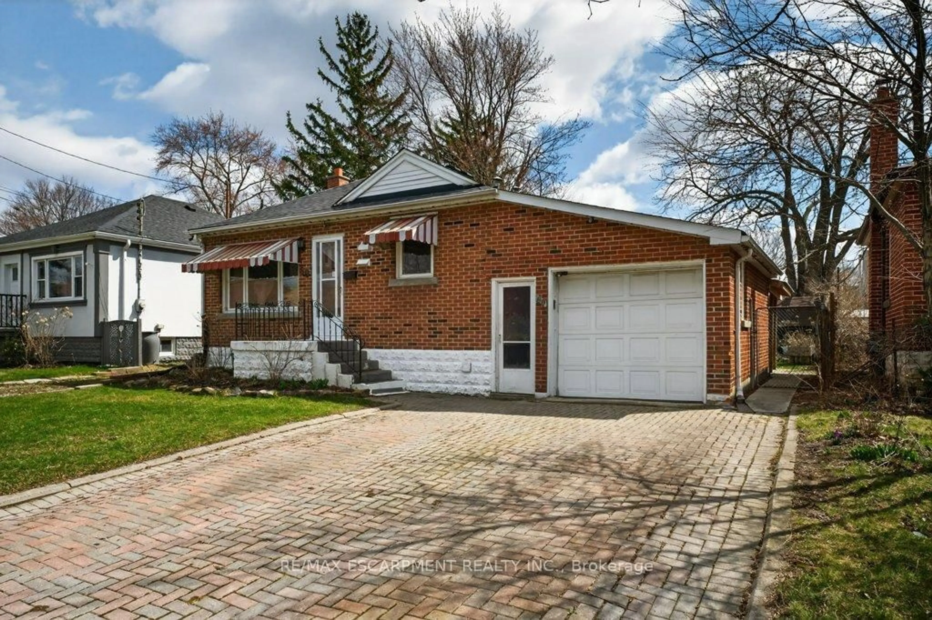 Home with brick exterior material, street for 69 West 4th St, Hamilton Ontario L9C 3M6