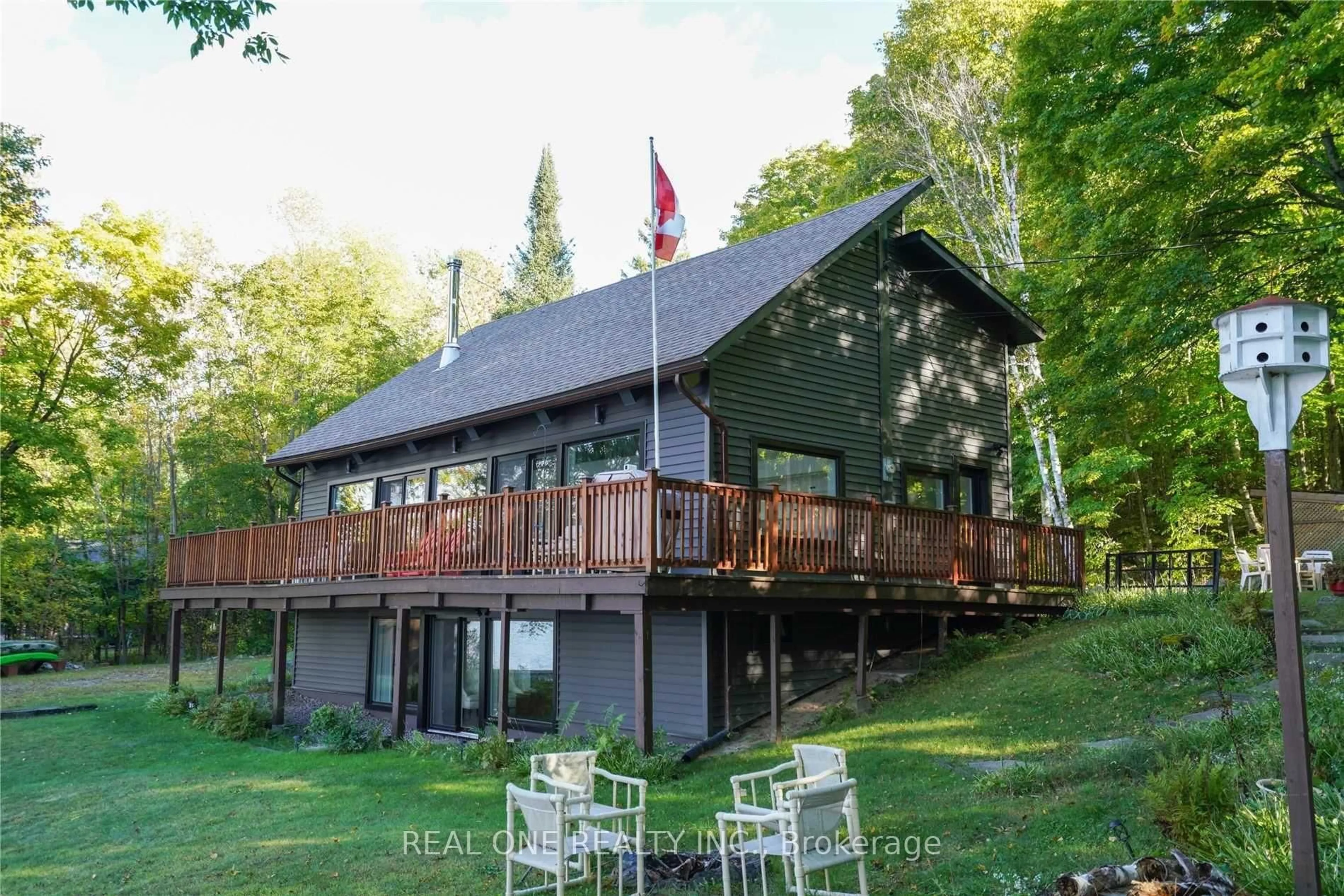 A pic from outside/outdoor area/front of a property/back of a property/a pic from drone, water/lake/river/ocean view for 1 Muskoka Estates Rd, Muskoka Lakes Ontario P0B 1J0
