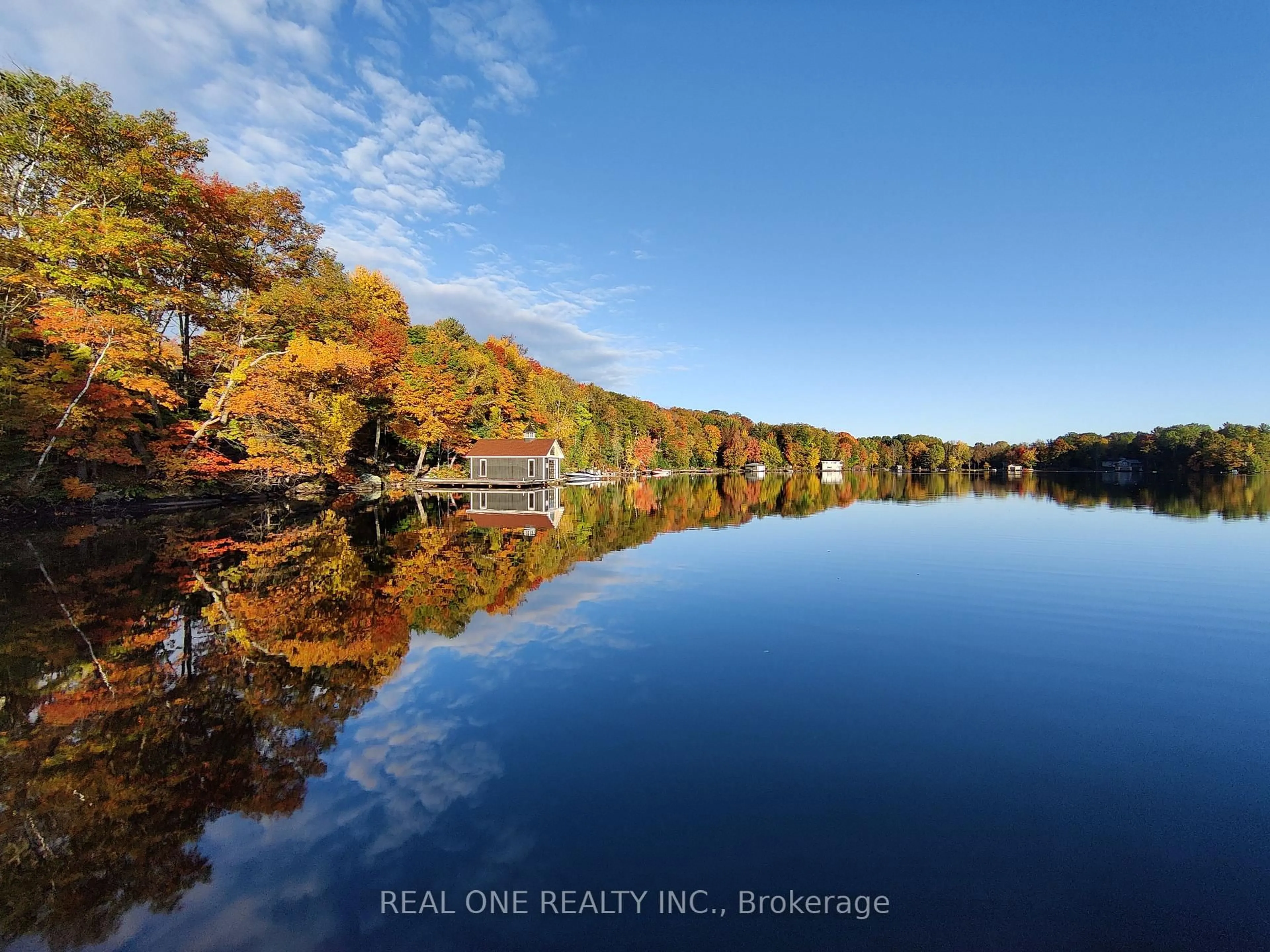 A pic from outside/outdoor area/front of a property/back of a property/a pic from drone, water/lake/river/ocean view for 1 Muskoka Estates Rd, Muskoka Lakes Ontario P0B 1J0