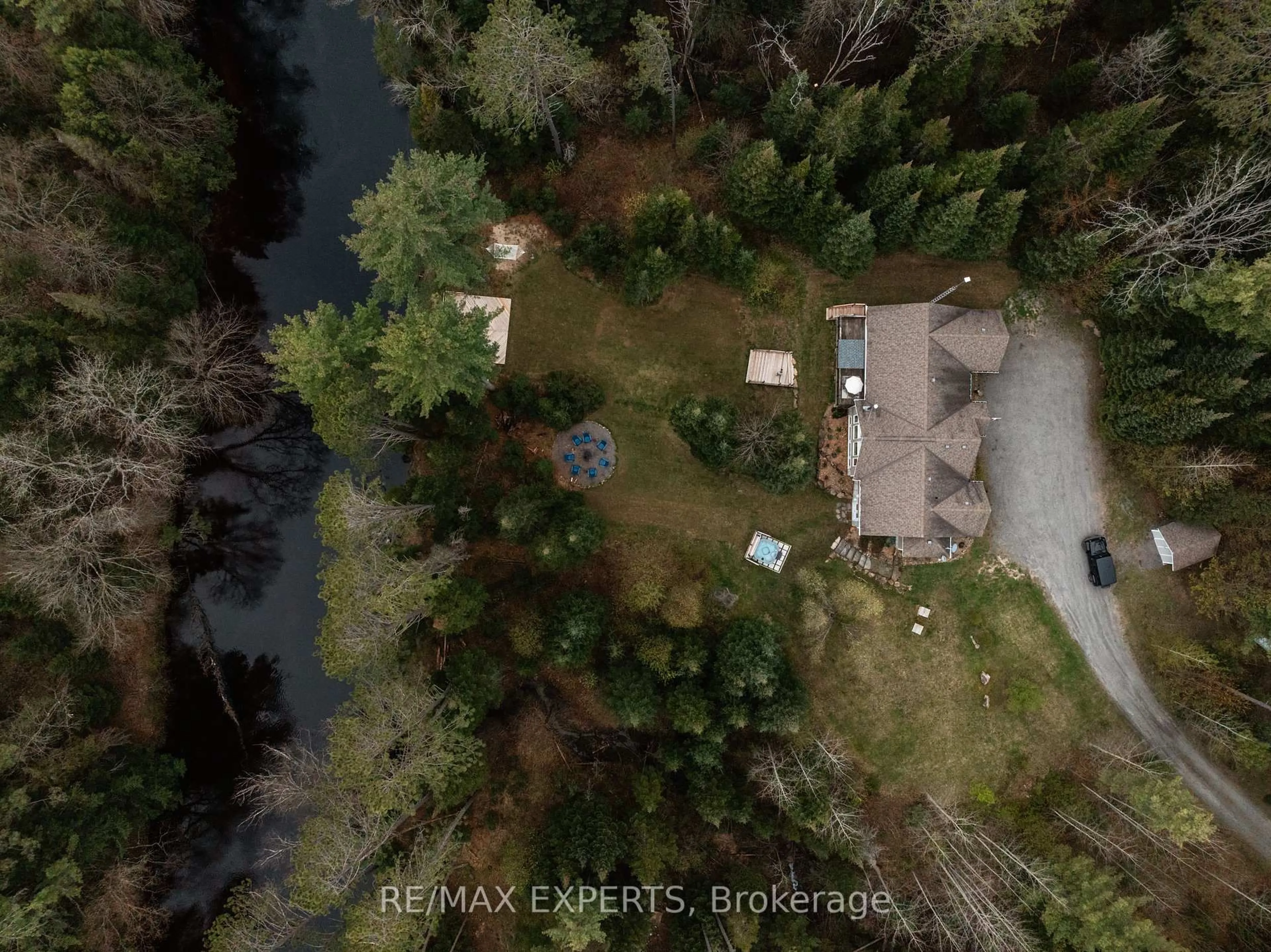 A pic from outside/outdoor area/front of a property/back of a property/a pic from drone, water/lake/river/ocean view for 1216 Miriam Dr, Bracebridge Ontario P1L 1X1