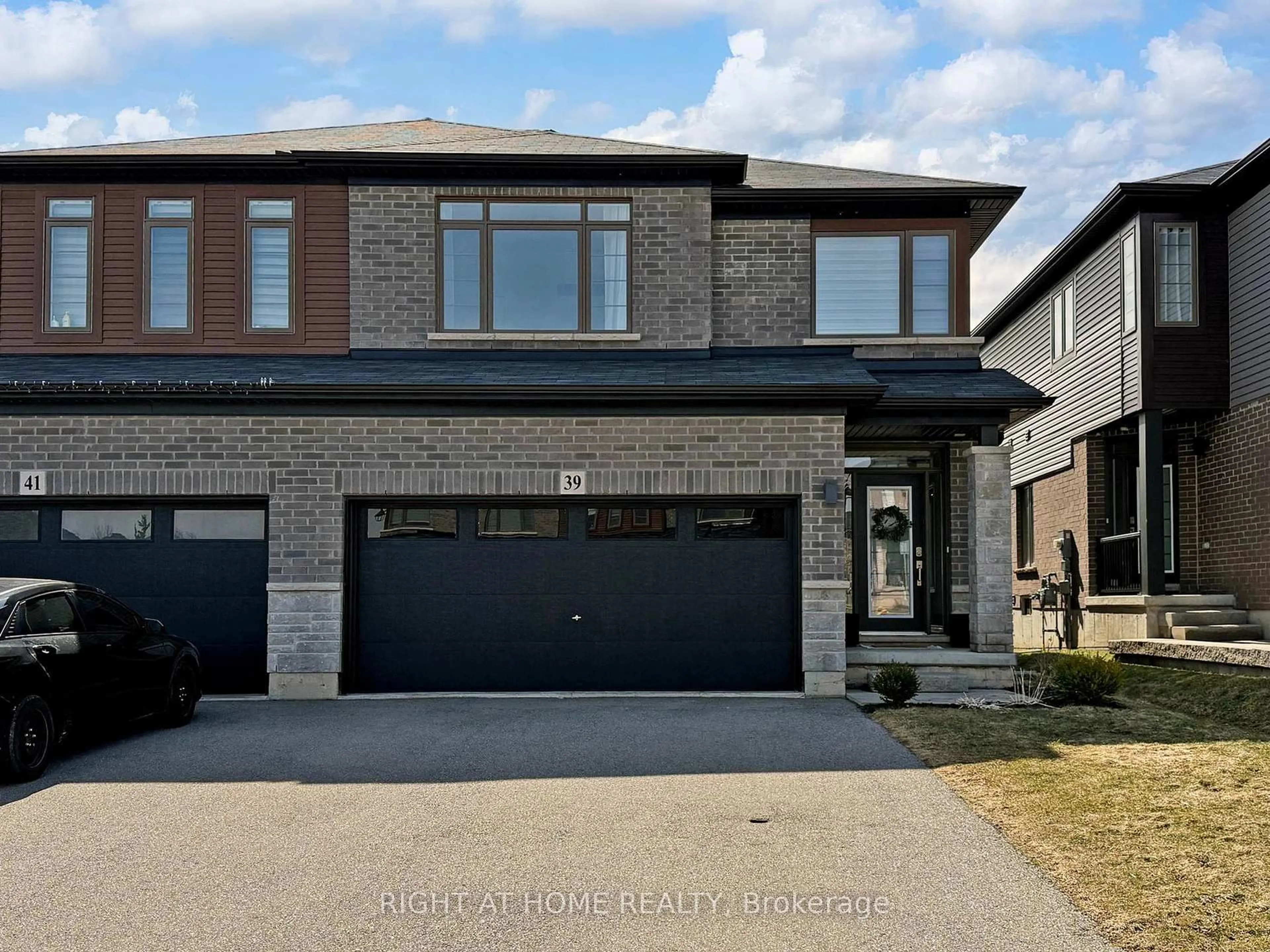 Home with brick exterior material, street for 39 Baker Lane, Brant Ontario N3L 0J7