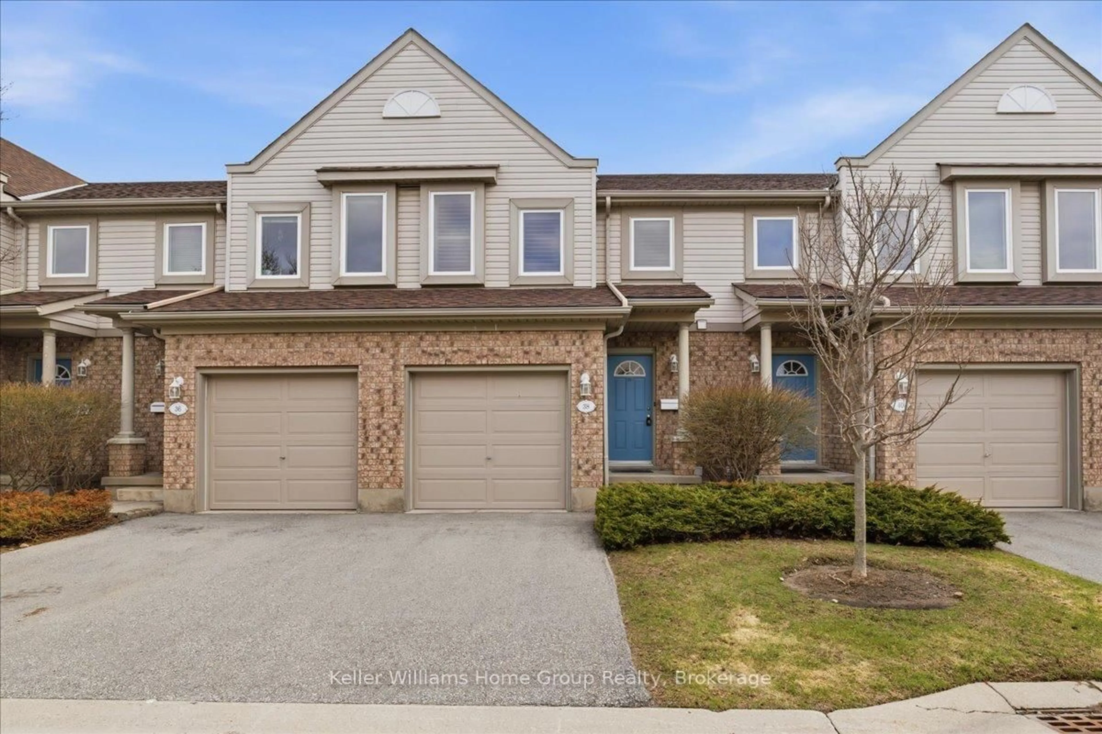 Home with brick exterior material, street for 38 ROEHAMPTON Cres, Guelph Ontario N1L 1M8