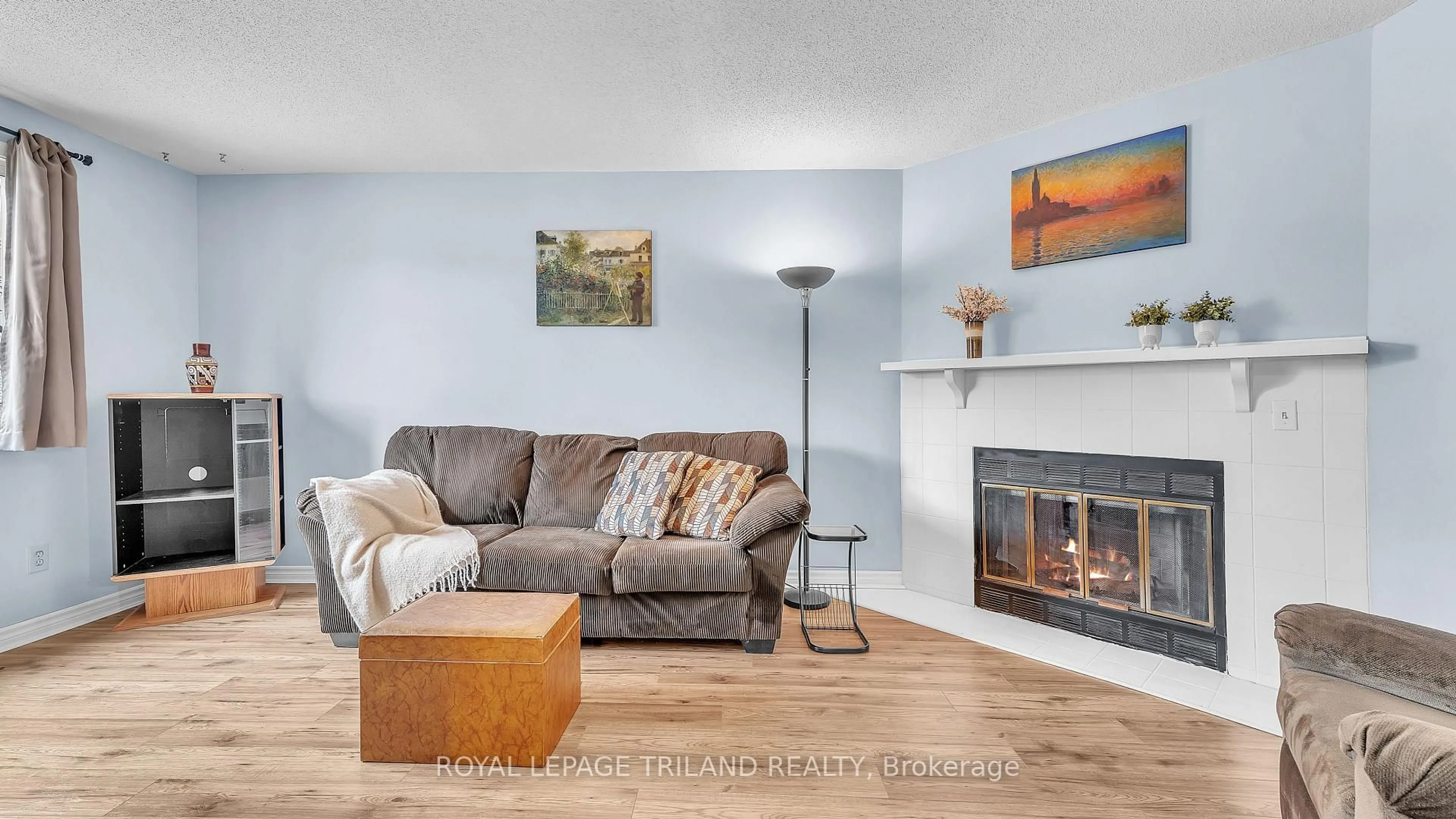 Living room with furniture, wood/laminate floor for 490 Third St #46, London East Ontario N5V 4A2