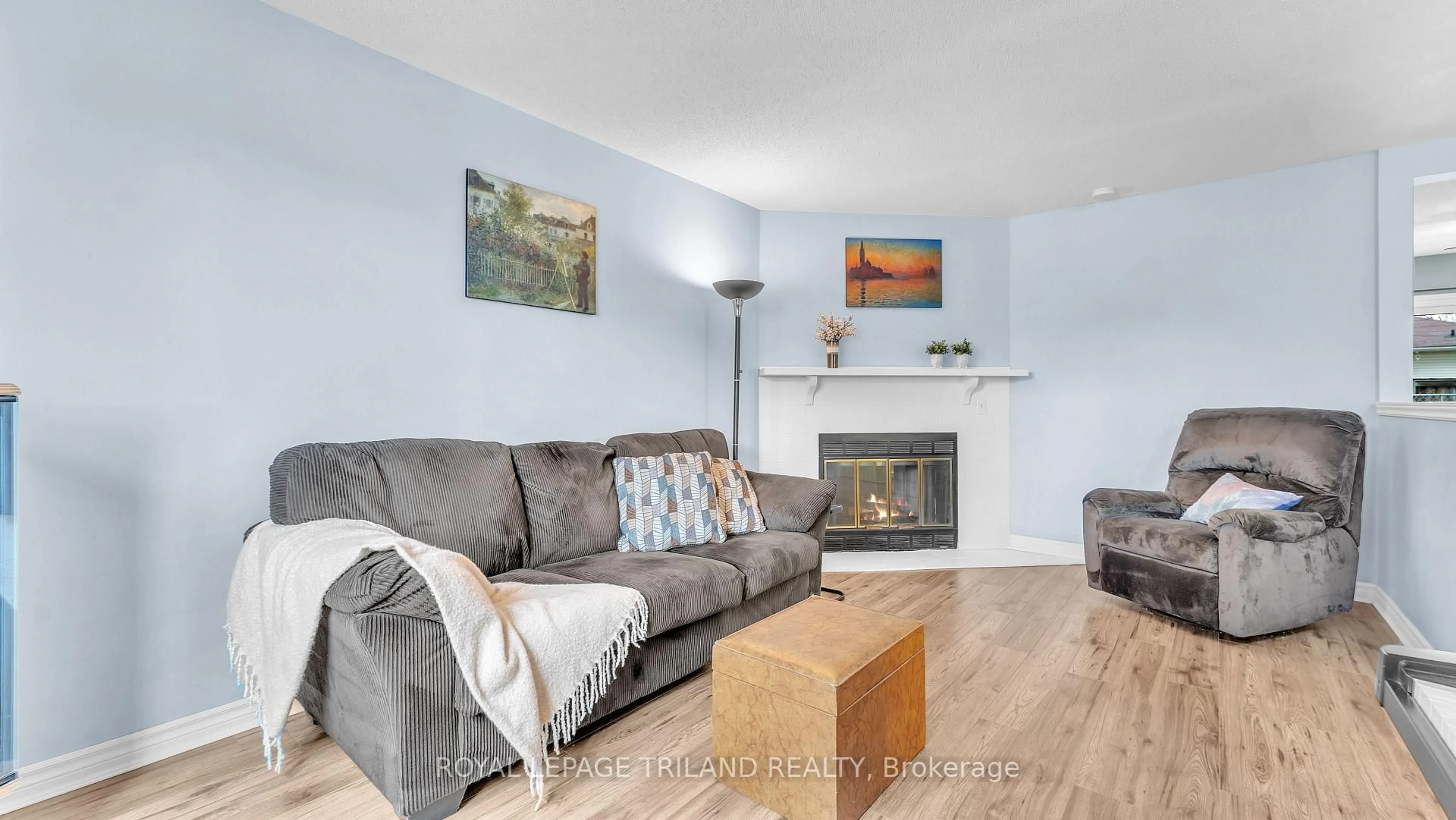 Living room with furniture, wood/laminate floor for 490 Third St #46, London East Ontario N5V 4A2