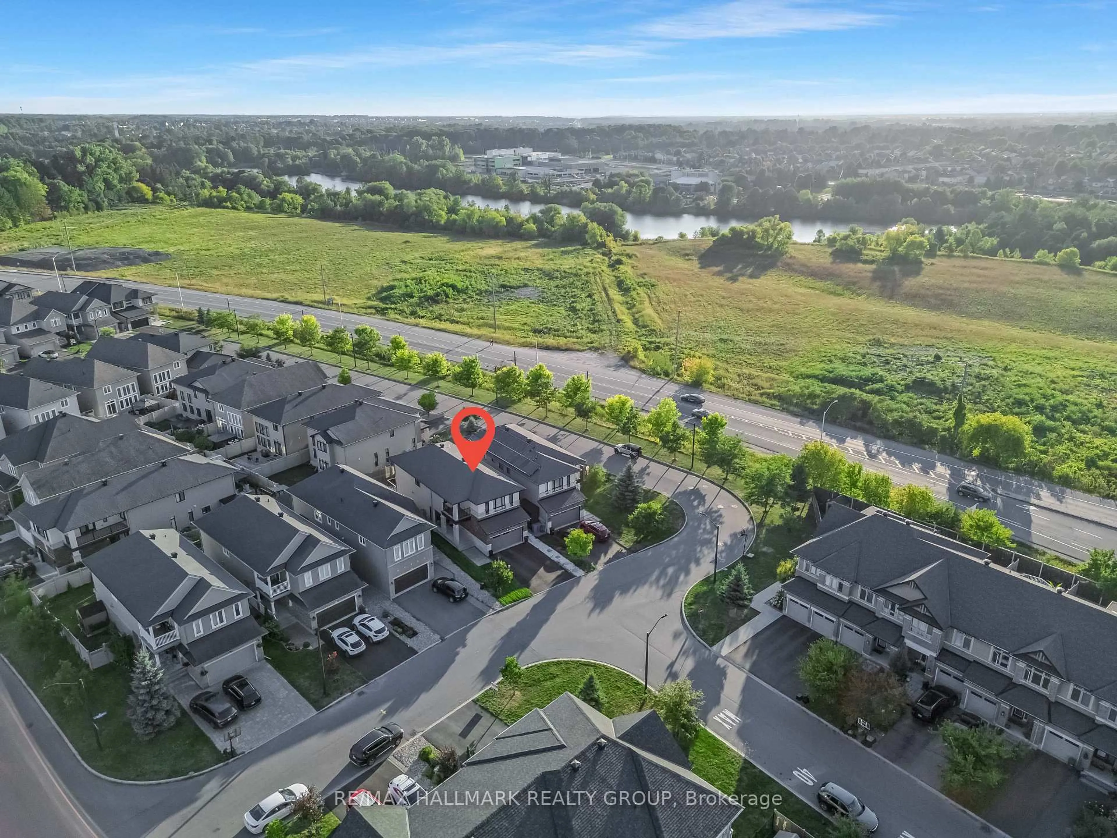 A pic from outside/outdoor area/front of a property/back of a property/a pic from drone, water/lake/river/ocean view for 327 BALLINVILLE Circ, Ottawa Ontario K4M 0C4