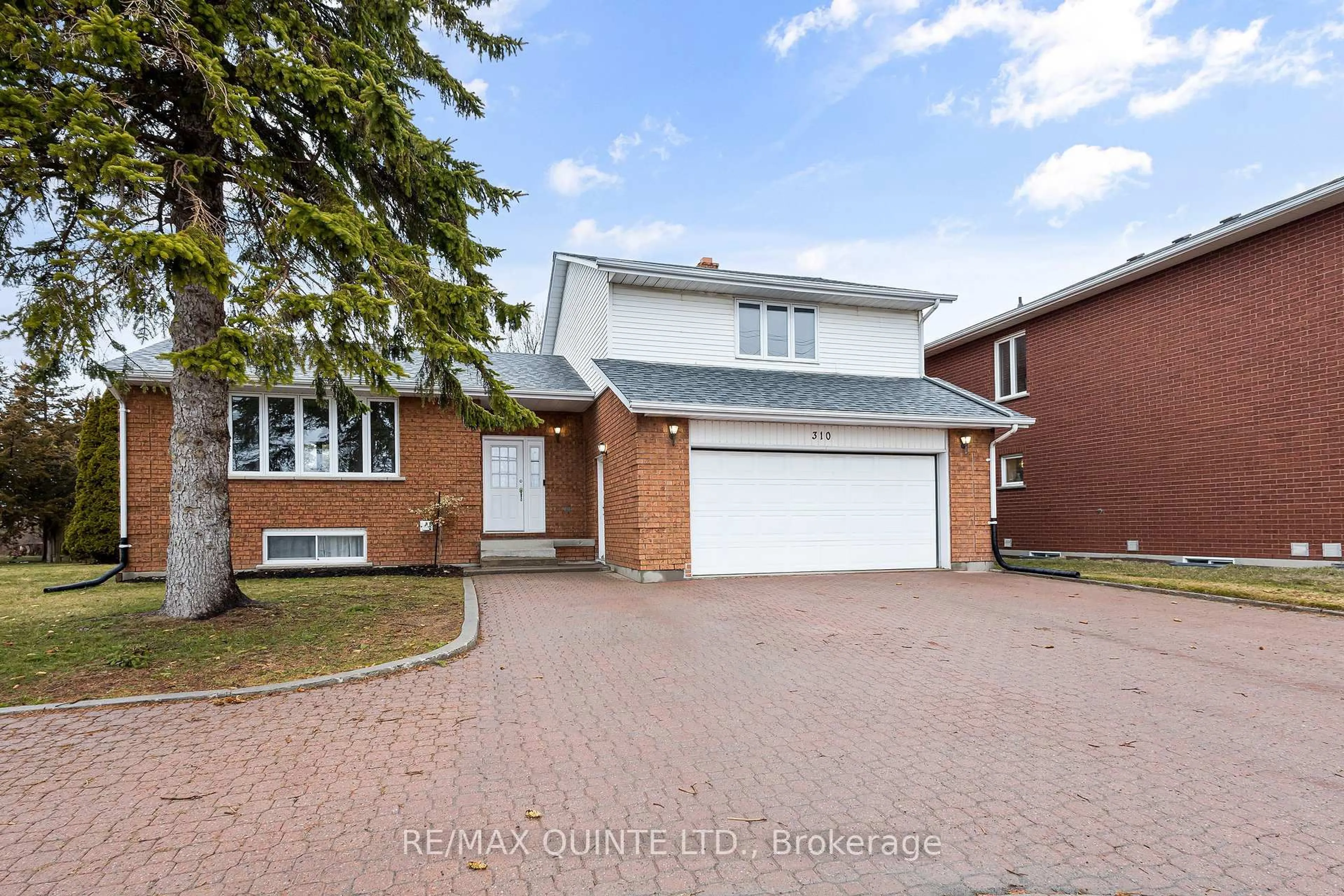 Home with brick exterior material, street for 310 Bridge St, Belleville Ontario K8N 4Z2