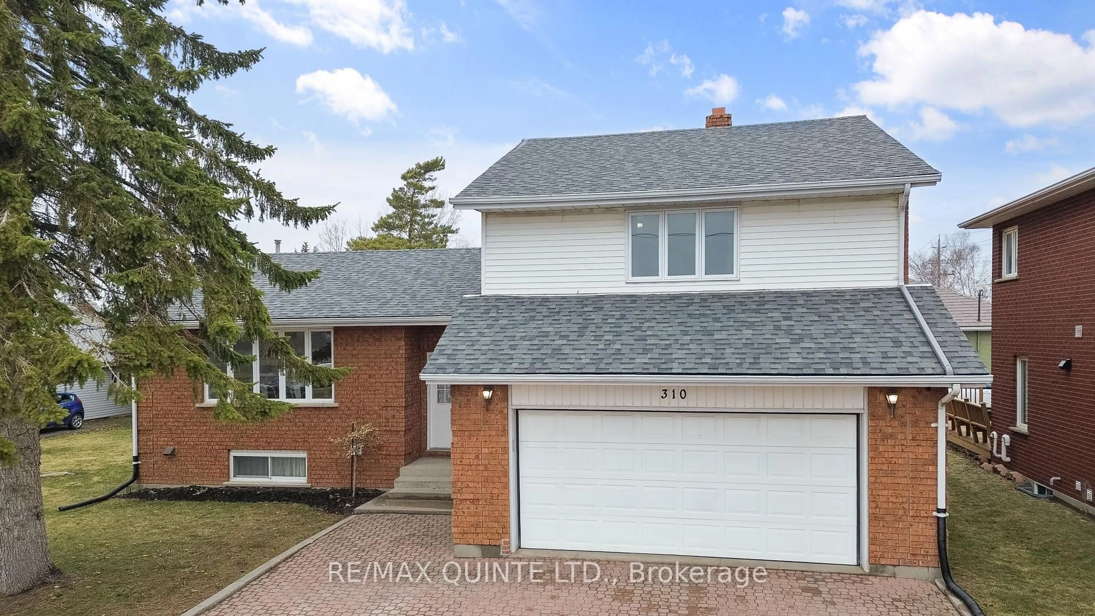 Home with vinyl exterior material, street for 310 Bridge St, Belleville Ontario K8N 4Z2