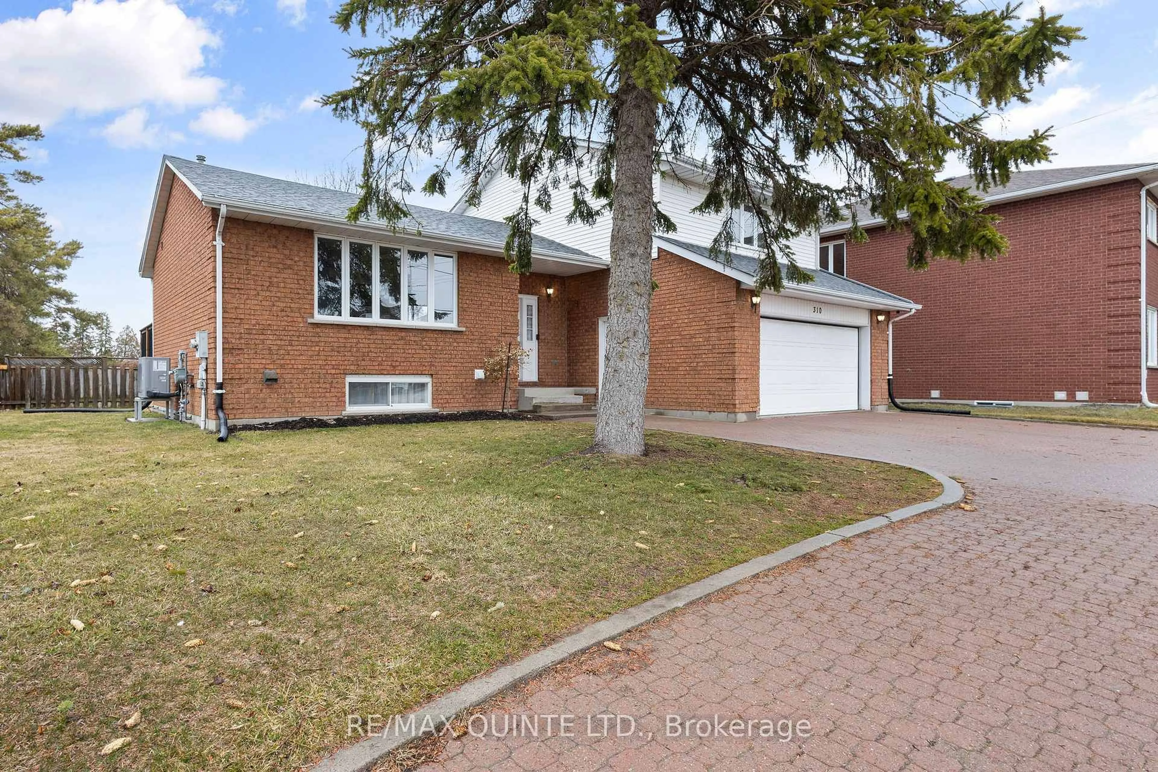 Home with brick exterior material, street for 310 Bridge St, Belleville Ontario K8N 4Z2