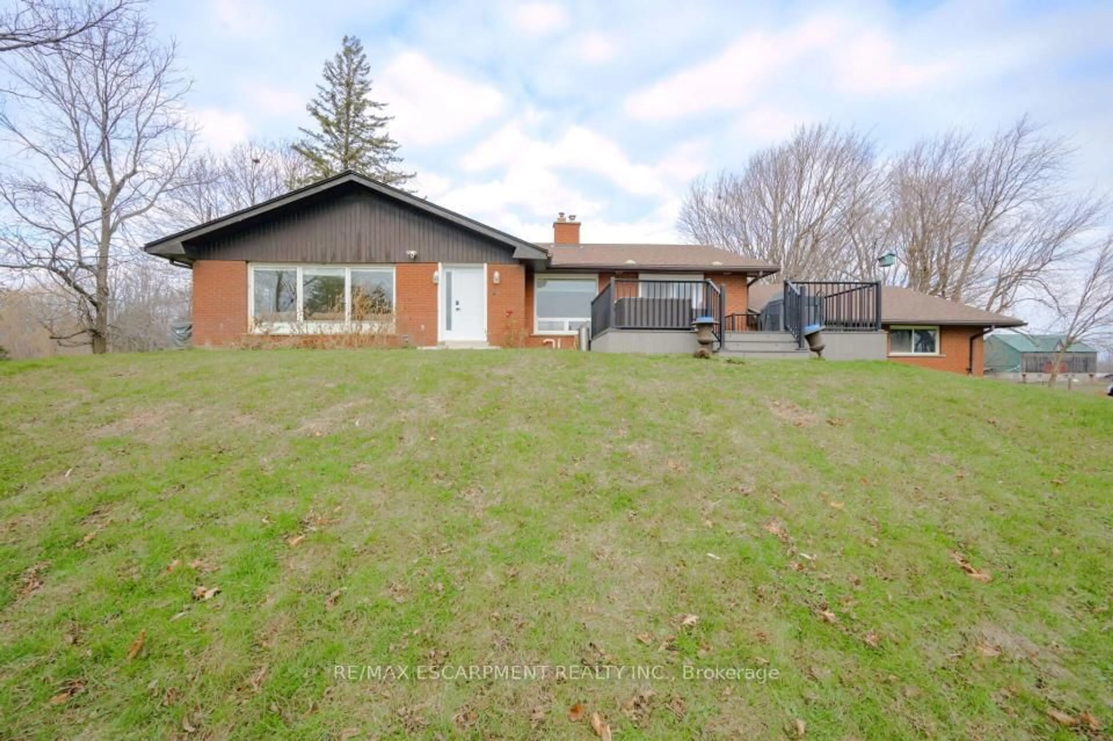 A pic from outside/outdoor area/front of a property/back of a property/a pic from drone, unknown for 491 Highway 5, Hamilton Ontario L9H 5E2