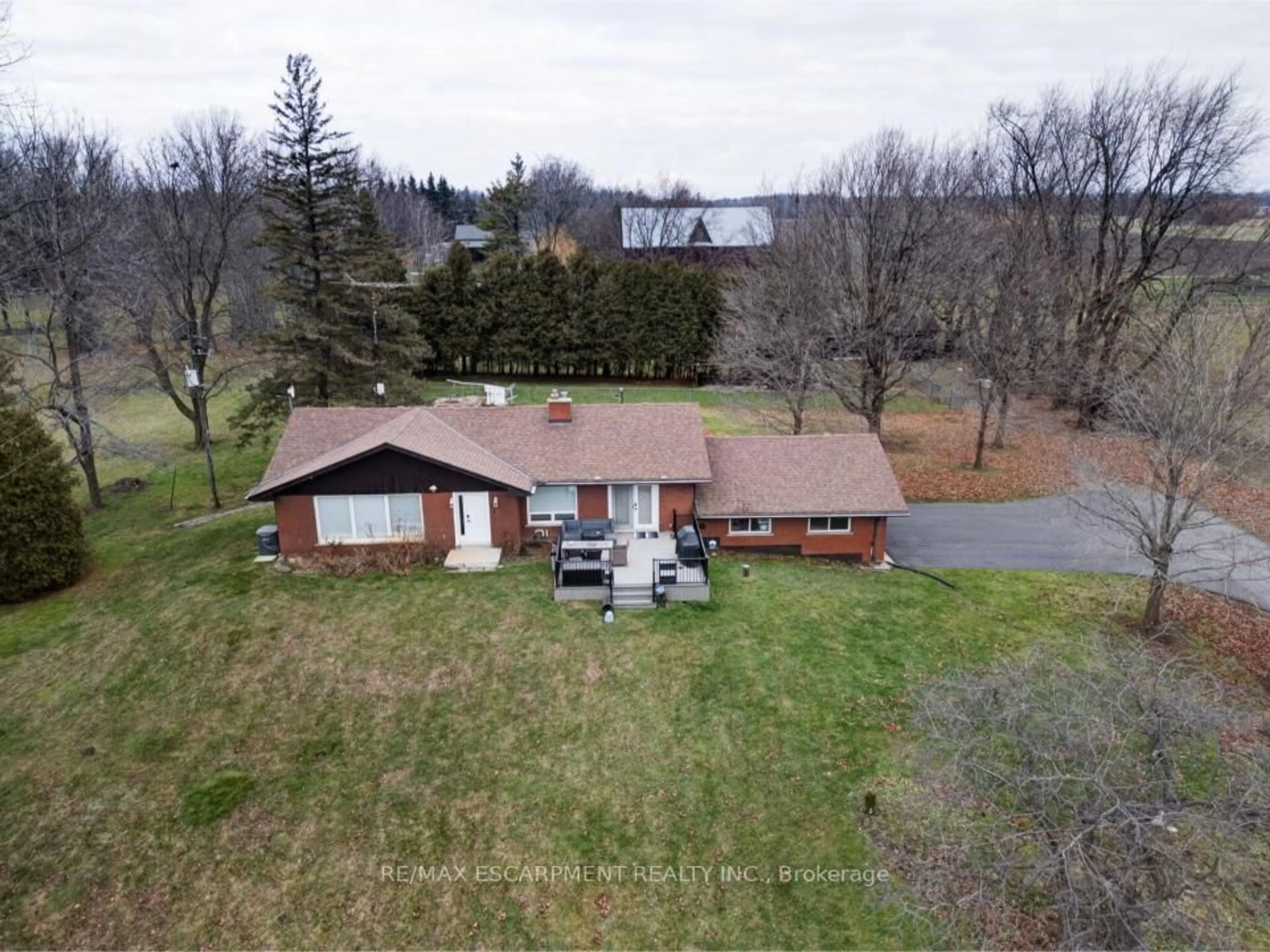 A pic from outside/outdoor area/front of a property/back of a property/a pic from drone, unknown for 491 Highway 5, Hamilton Ontario L9H 5E2
