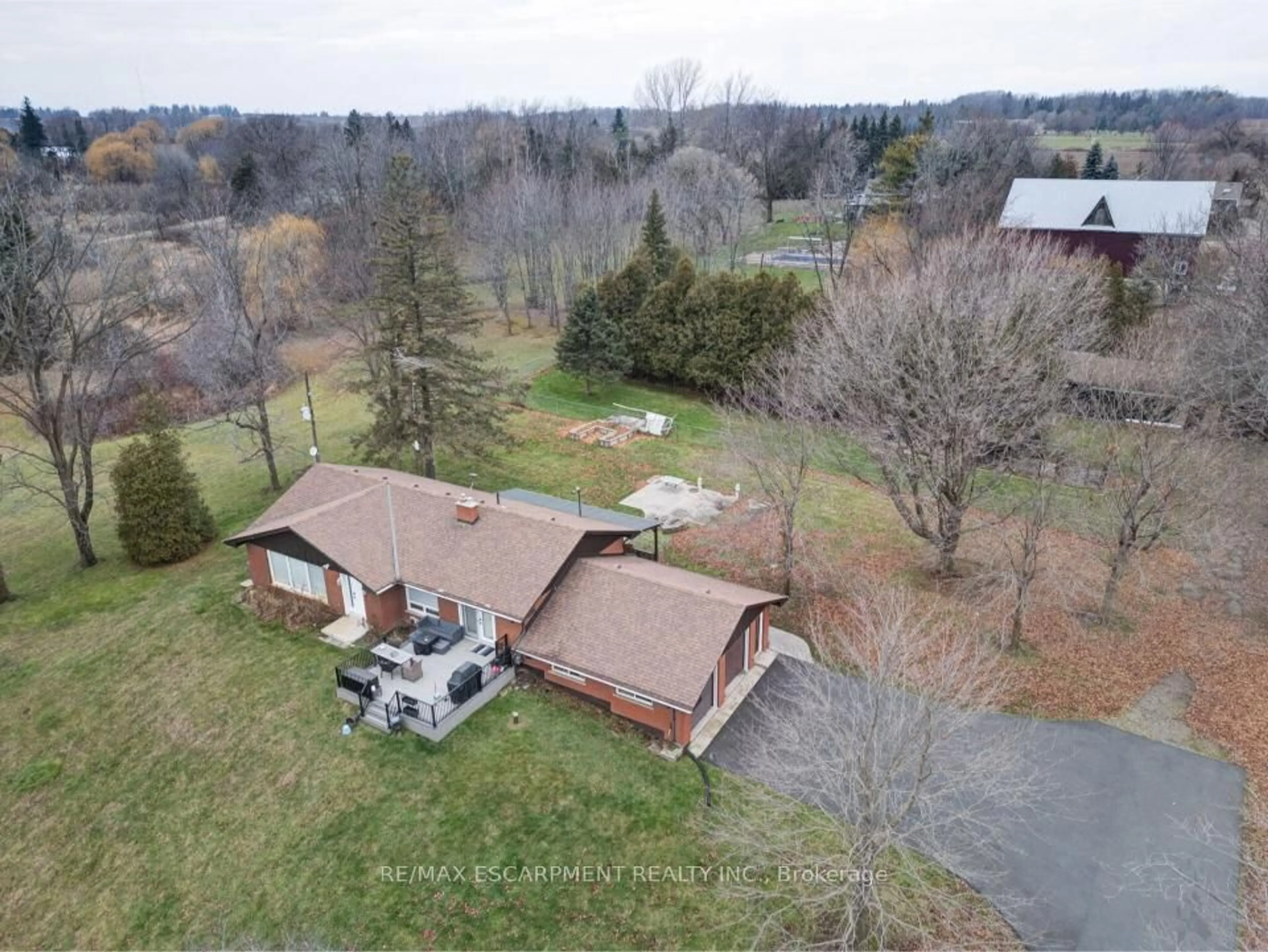 A pic from outside/outdoor area/front of a property/back of a property/a pic from drone, unknown for 491 Highway 5, Hamilton Ontario L9H 5E2