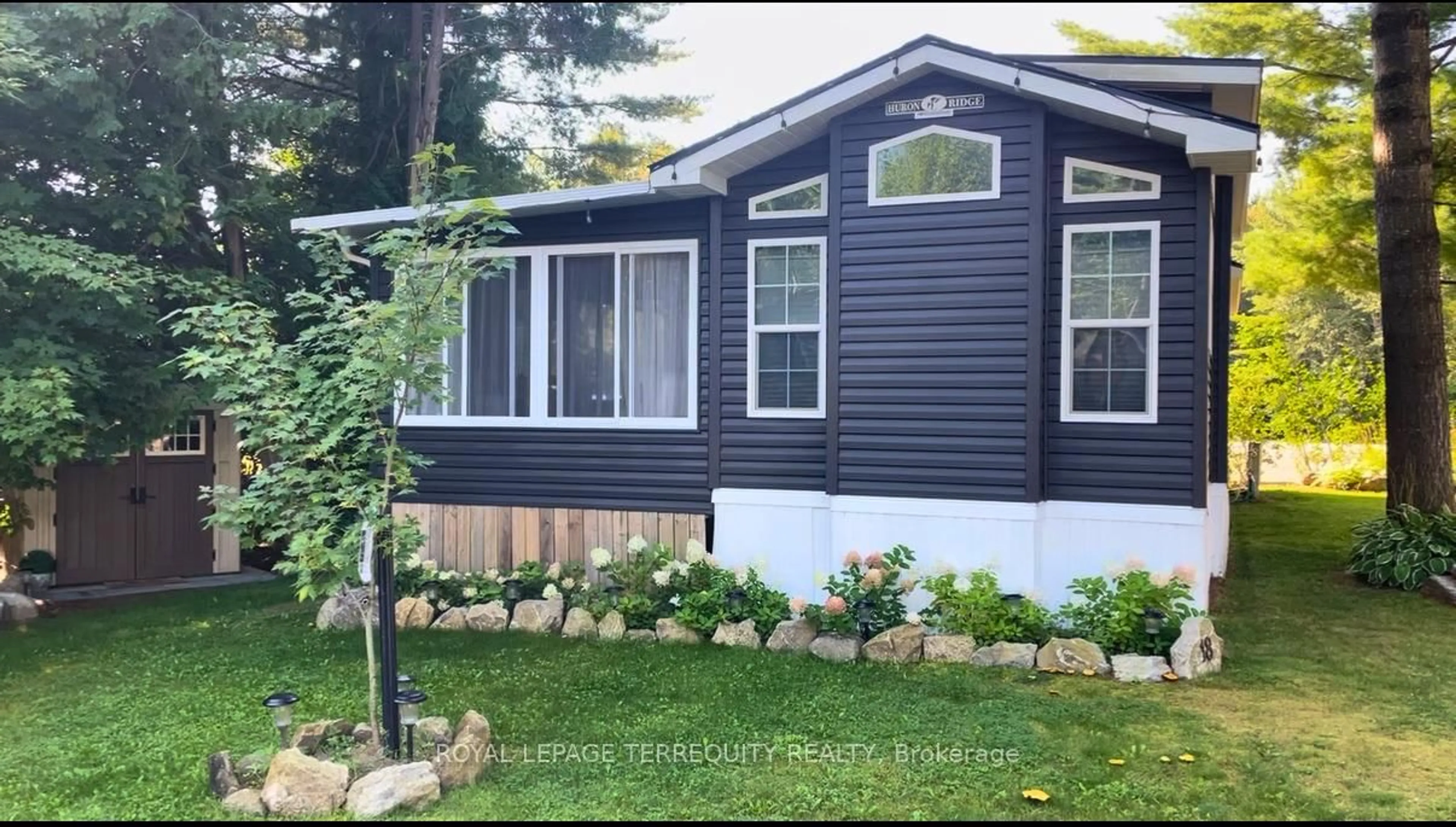 Home with vinyl exterior material, street for 18 Rockhaven, Selwyn Ontario K0L 2H0