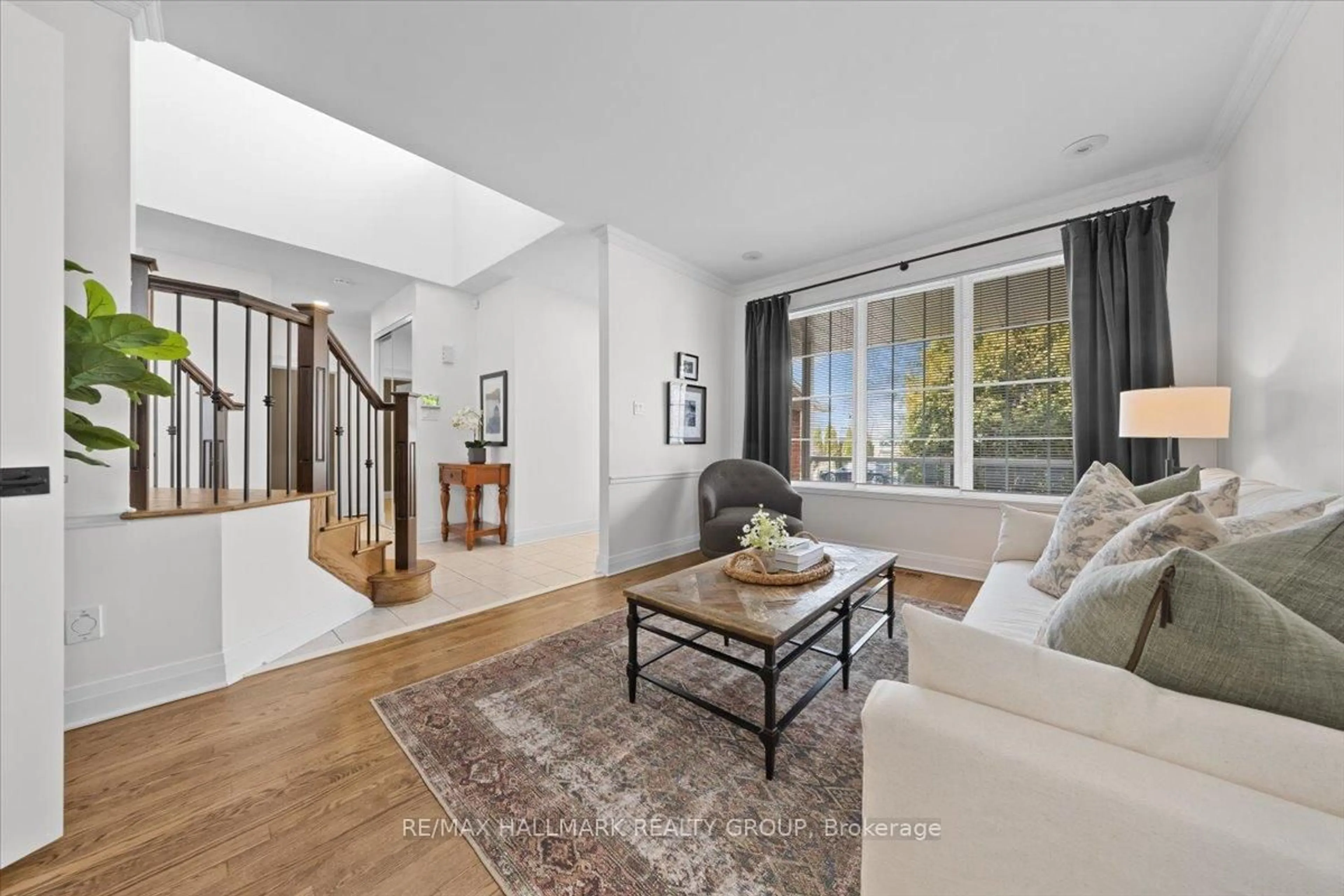 Living room with furniture, unknown for 5849 Gladewoods Pl, Ottawa Ontario K1W 1G6