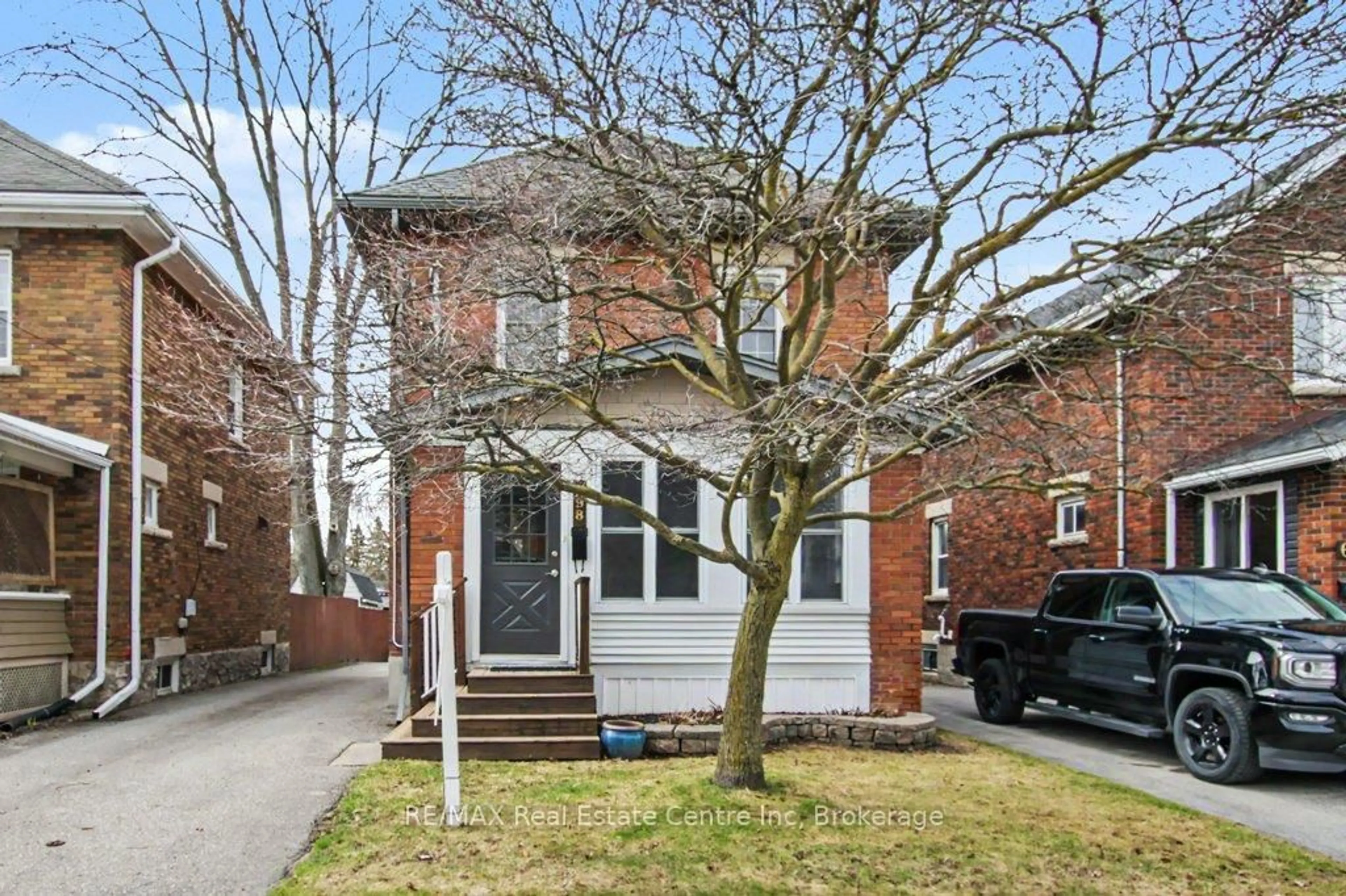 Home with brick exterior material, street for 598 Woolwich St, Guelph Ontario N1H 3Y2