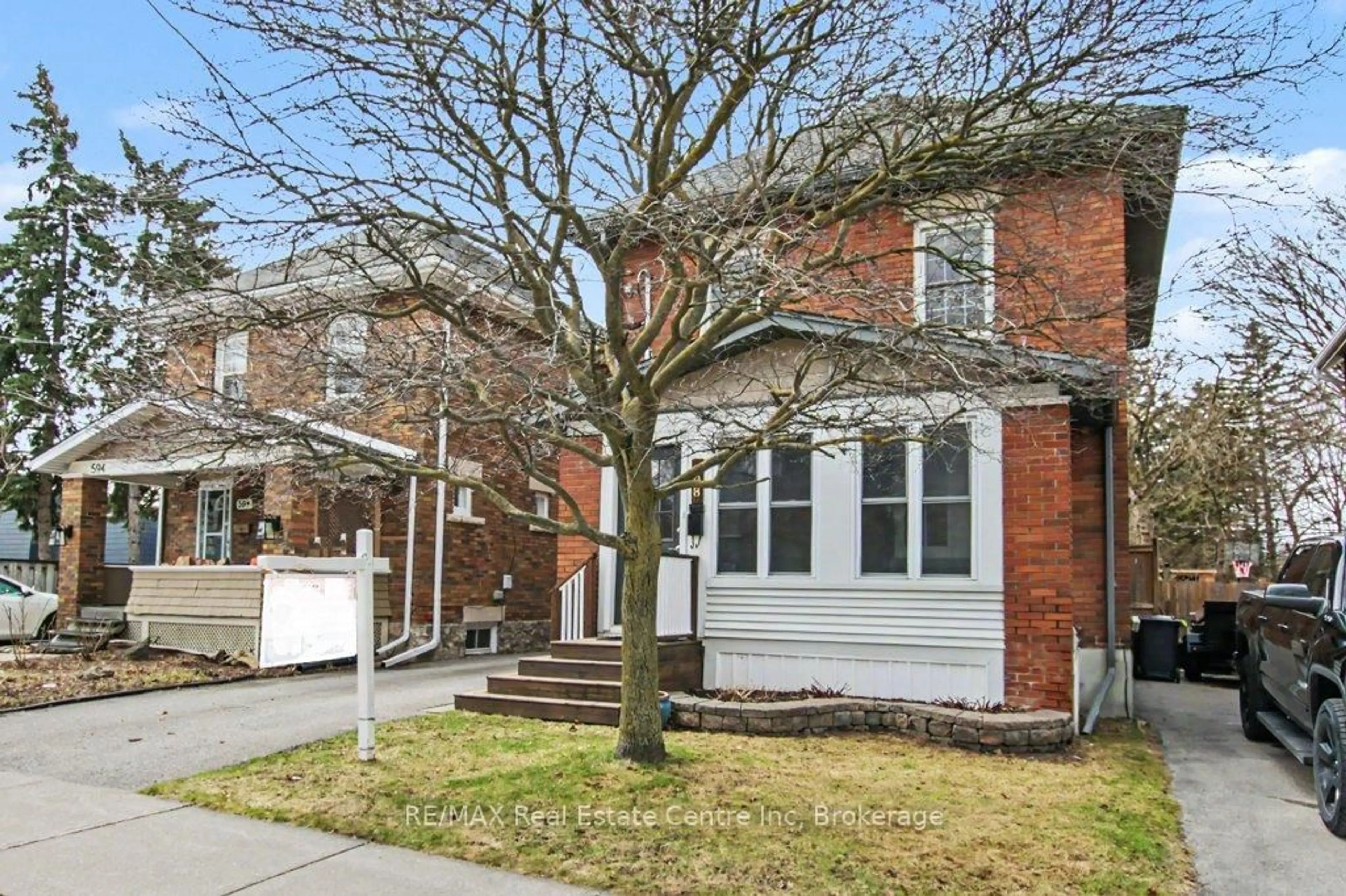 Home with brick exterior material, street for 598 Woolwich St, Guelph Ontario N1H 3Y2