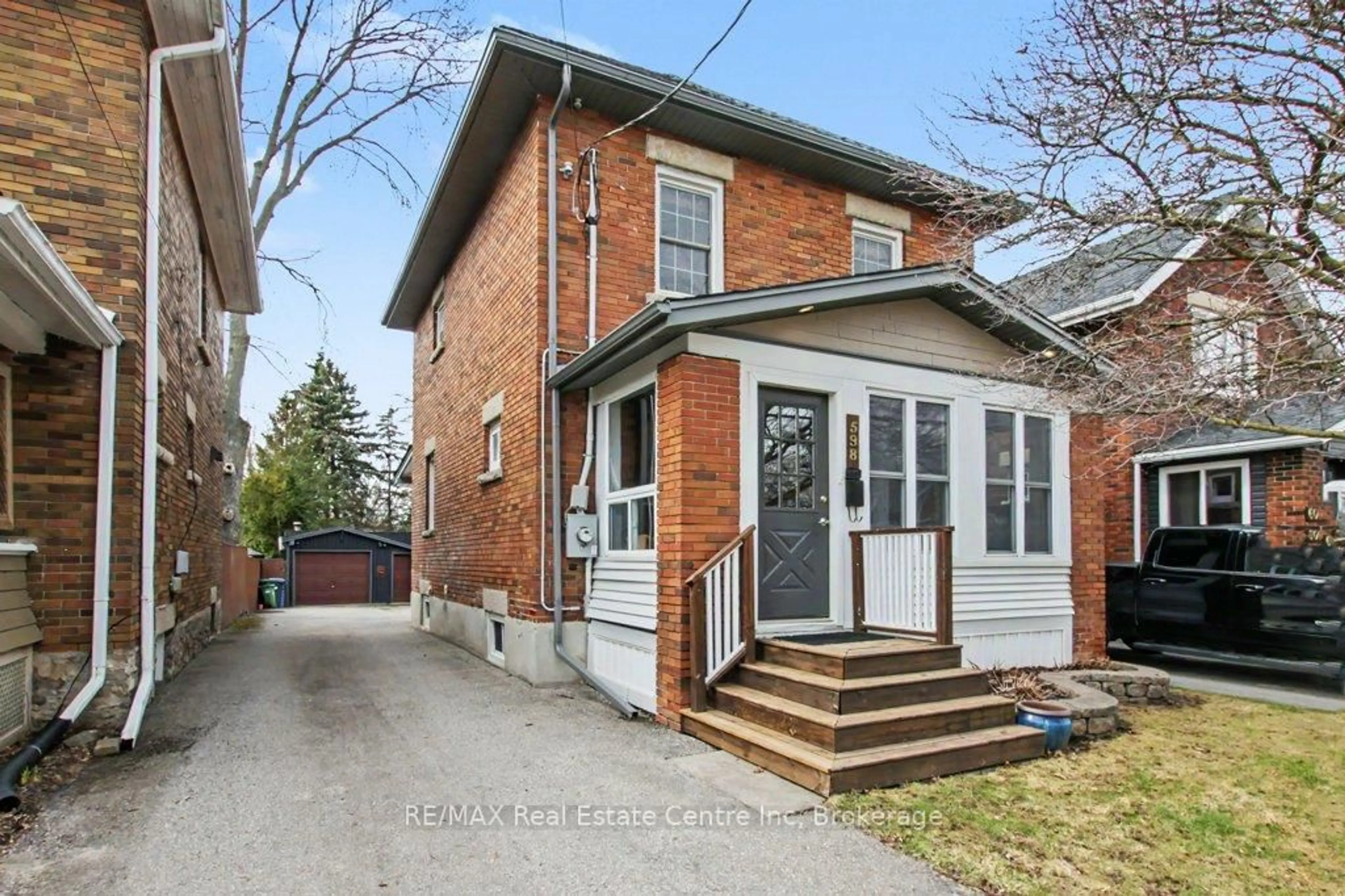 Home with brick exterior material, street for 598 Woolwich St, Guelph Ontario N1H 3Y2