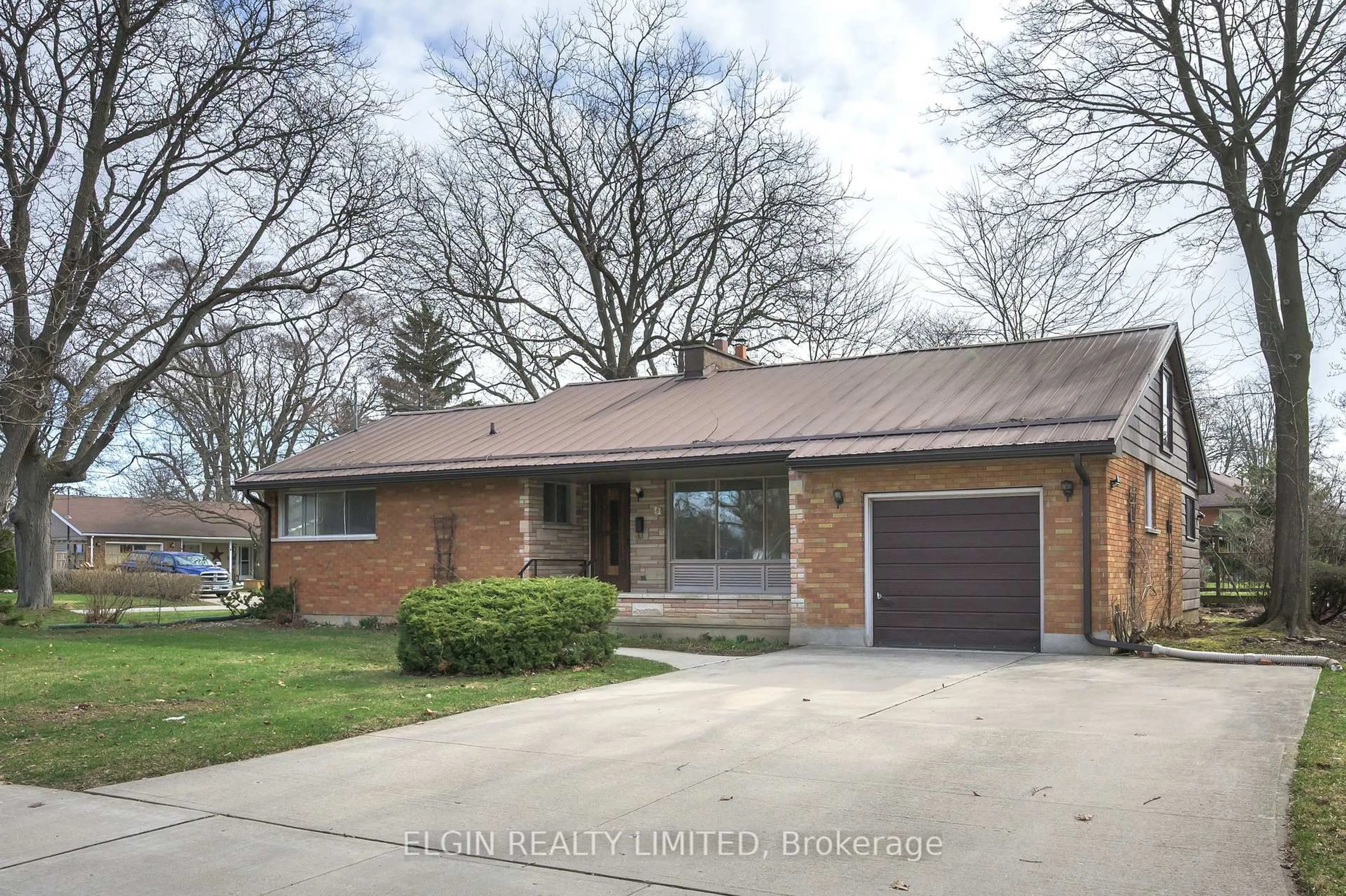 Home with brick exterior material, street for 8 Ermatinger St, St. Thomas Ontario N5R 4K4