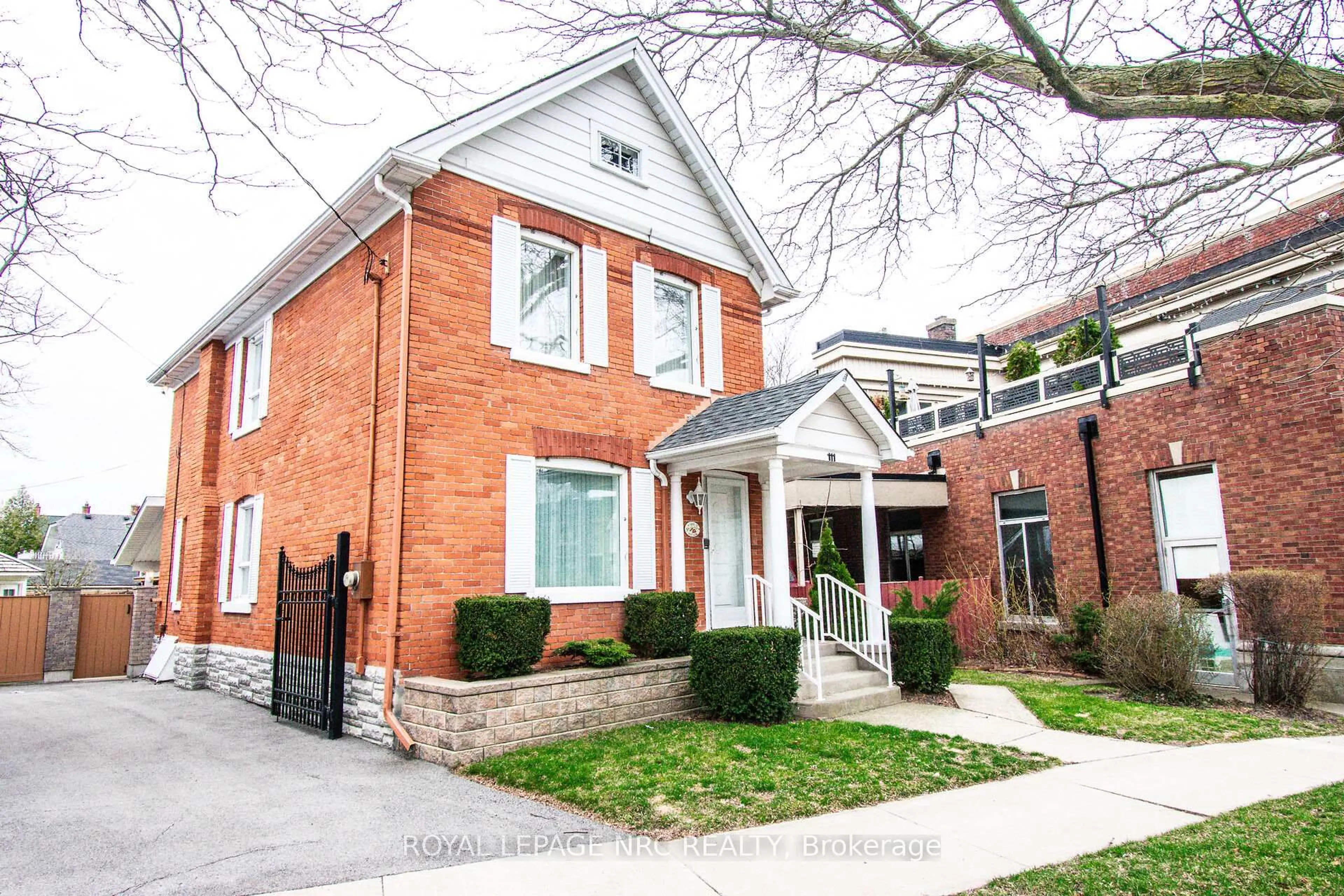 Home with brick exterior material, street for 111 Lake St, St. Catharines Ontario L2R 5X7