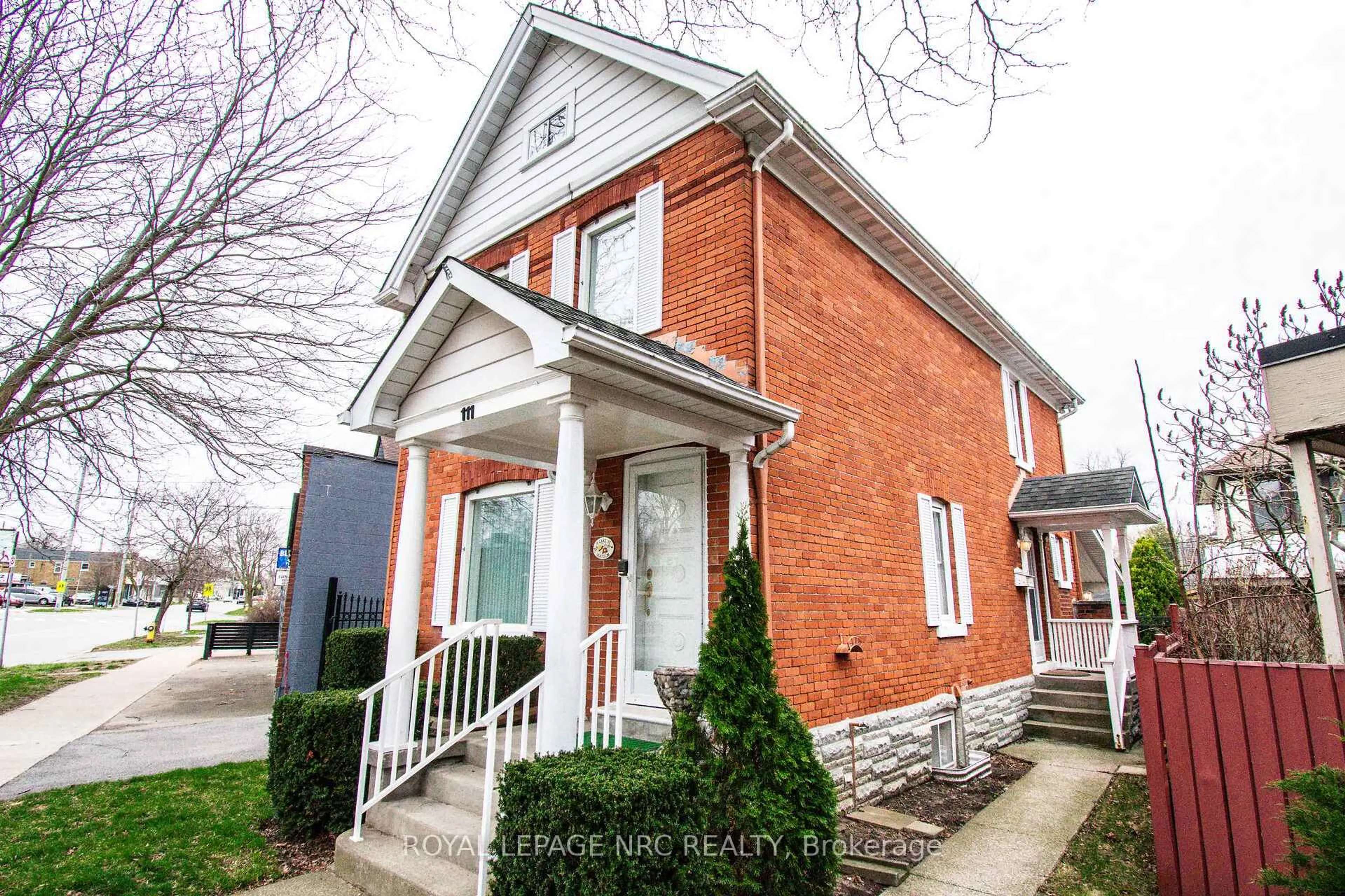 Home with brick exterior material, street for 111 Lake St, St. Catharines Ontario L2R 5X7
