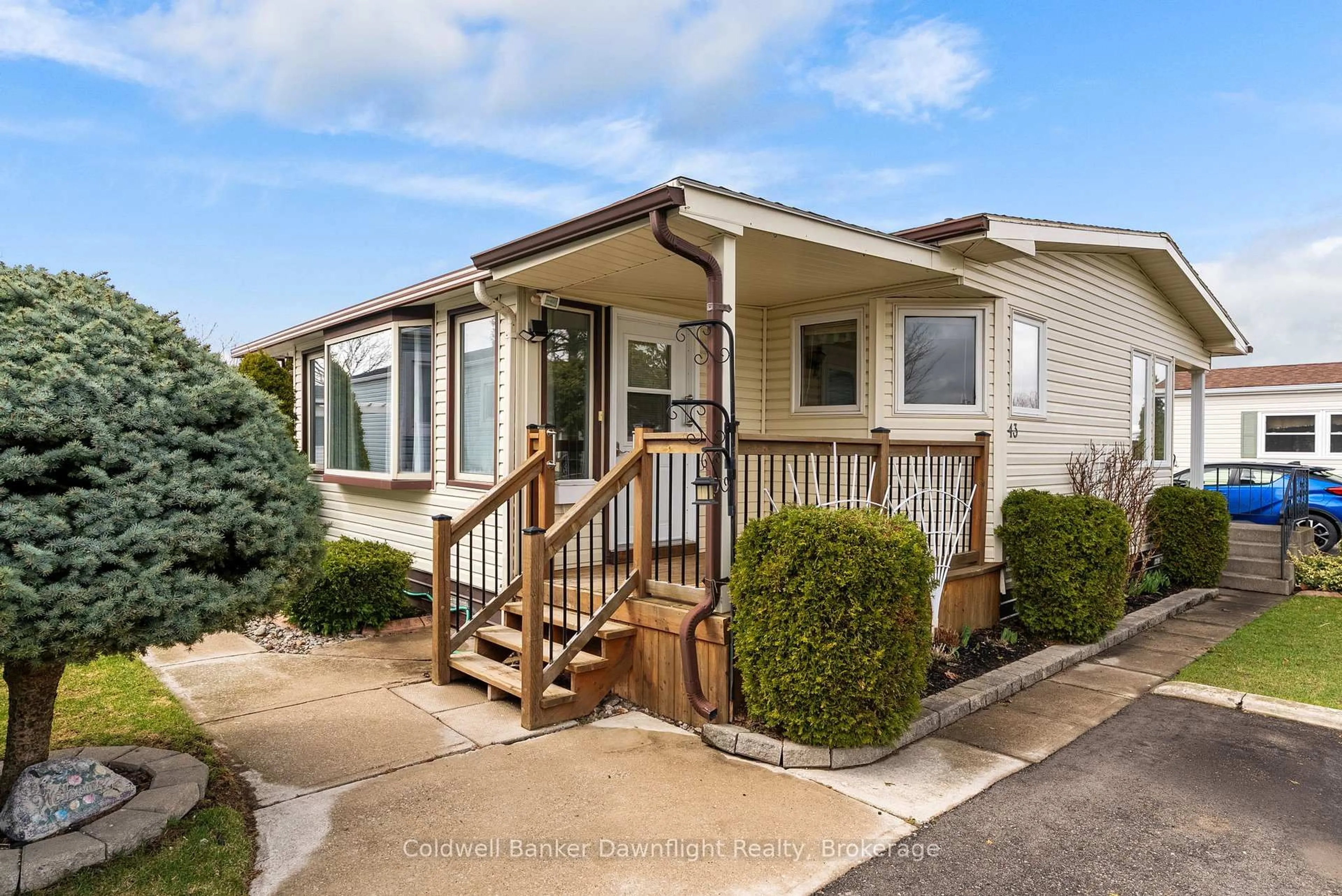 Home with vinyl exterior material, street for 43 Redford Dr, South Huron Ontario N0M 1S3