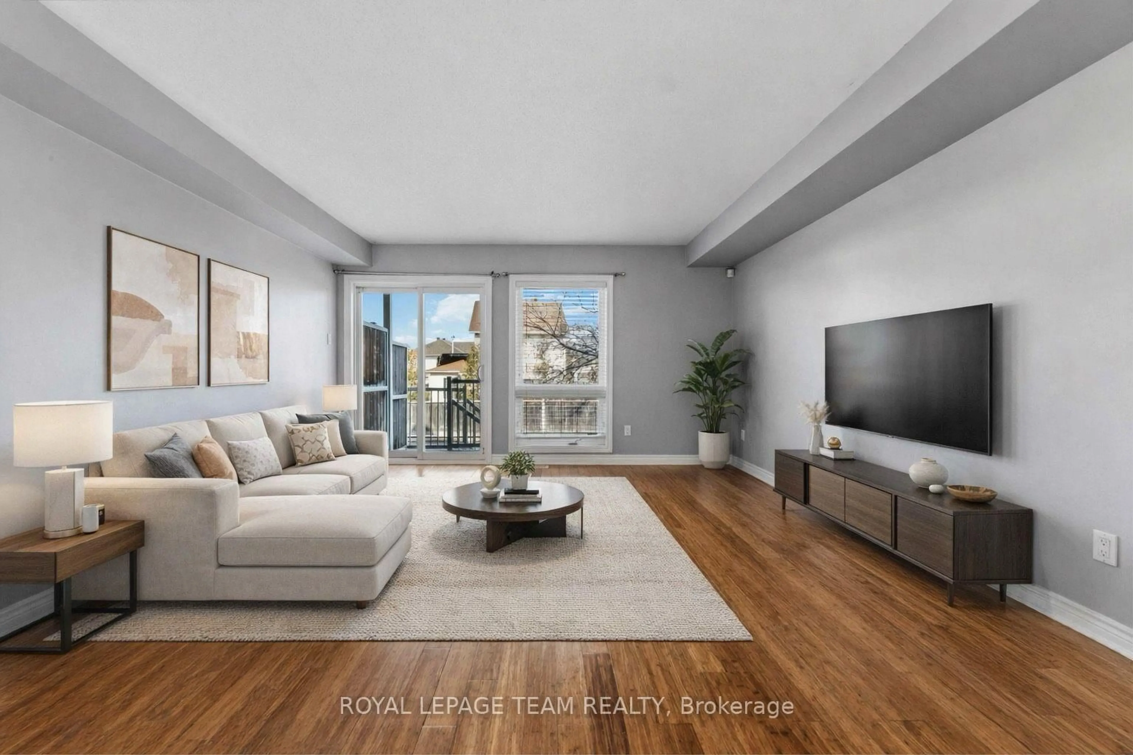 Living room with furniture, unknown for 405 Chapman Mills Dr #A, Ottawa Ontario K2J 0M7