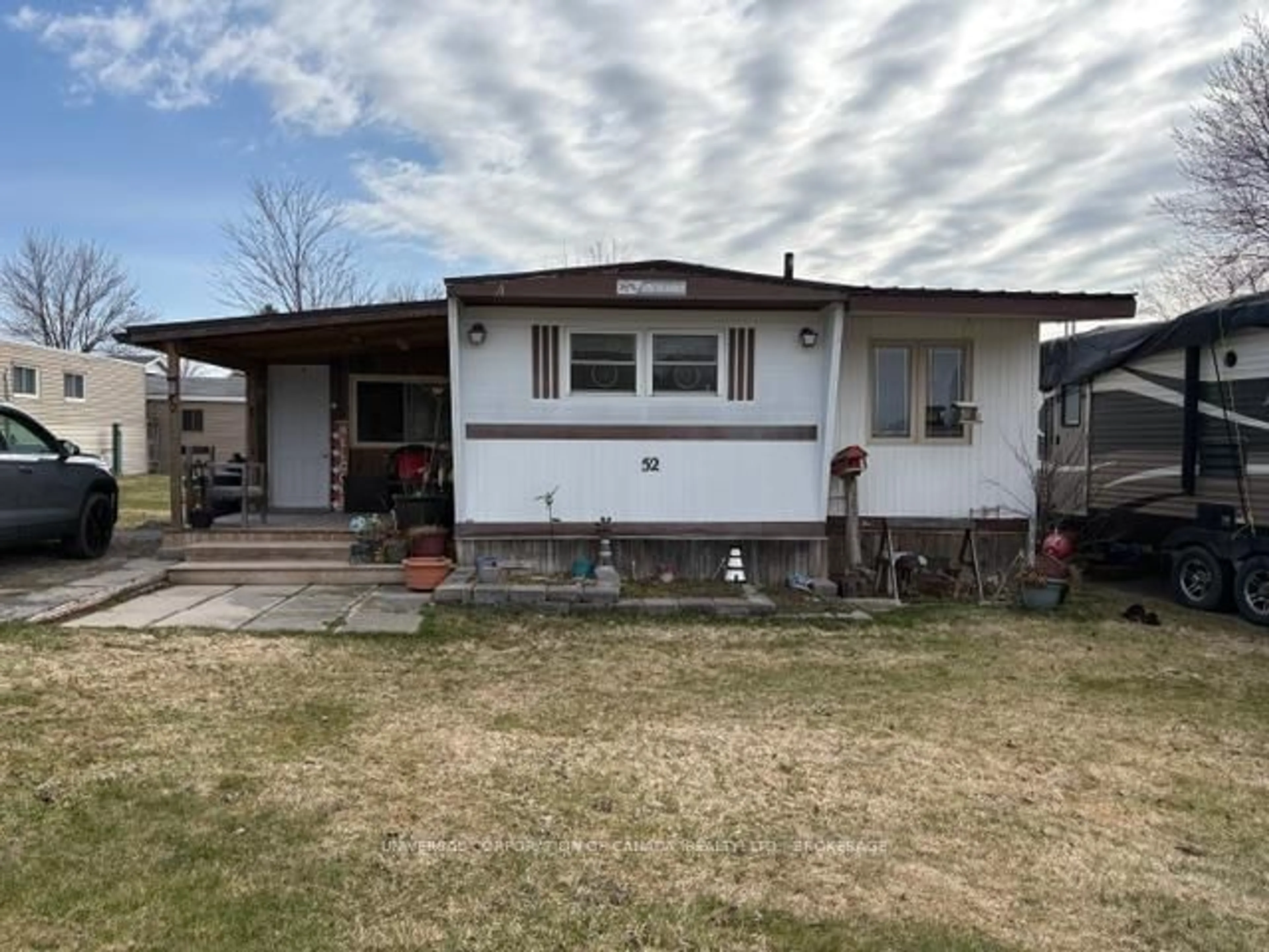 Home with vinyl exterior material, street for 52 cedarville Ave, Malahide Ontario N0L 2J0