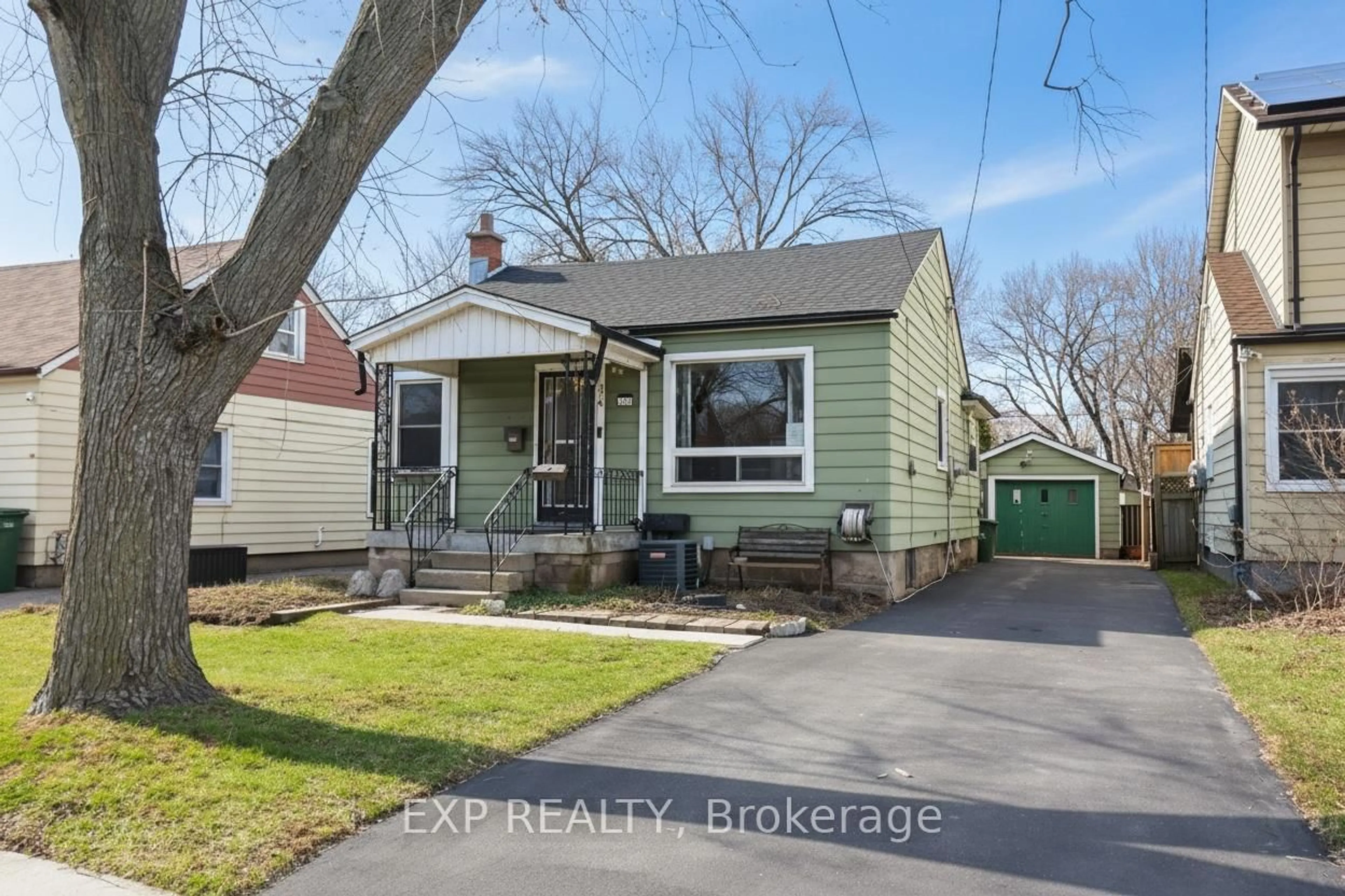 Home with vinyl exterior material, street for 376 Tragina Ave, Hamilton Ontario L8H 5E5