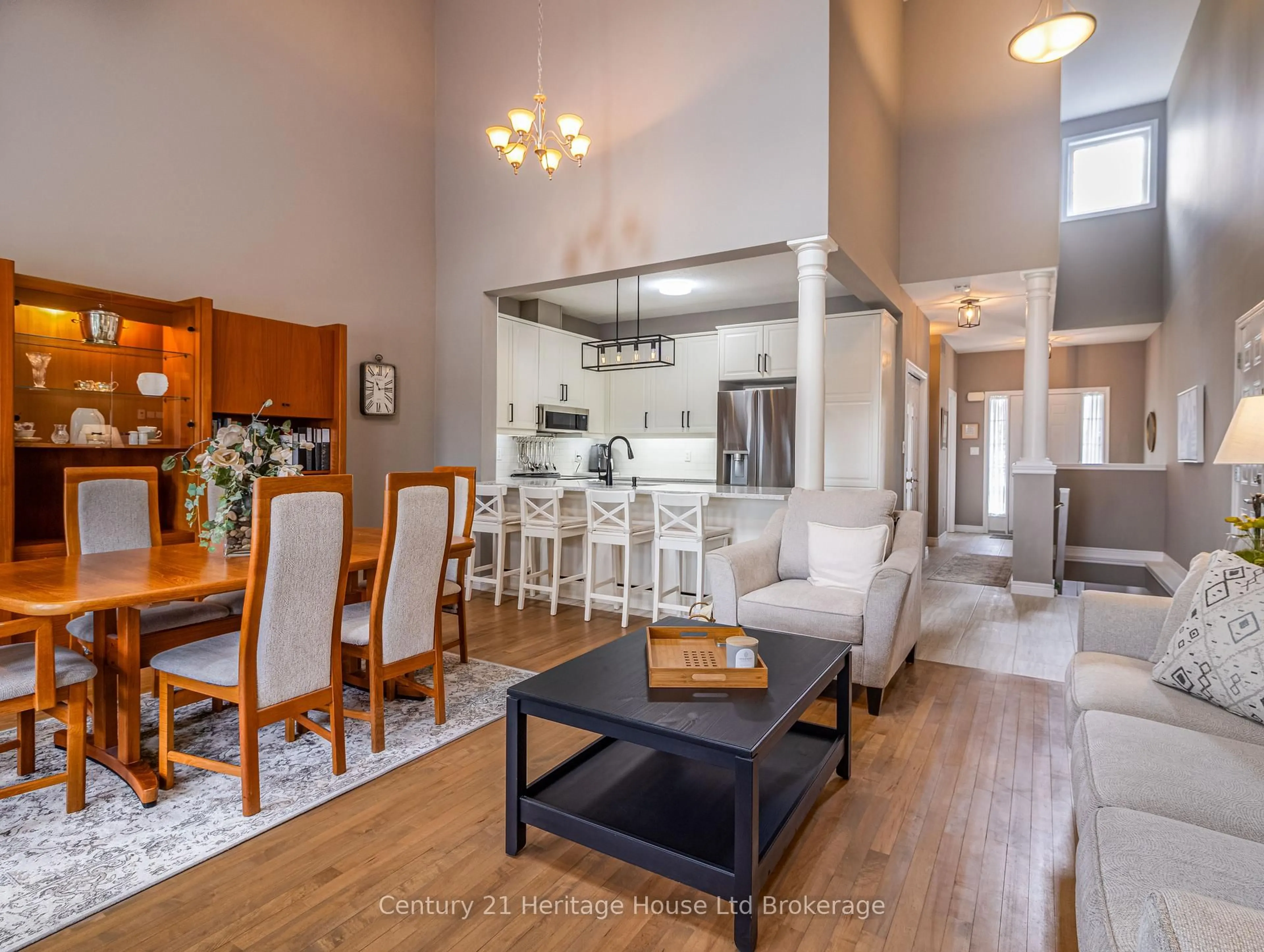 Open concept kitchen, wood/laminate floor for 735 Garden Court Cres, Woodstock Ontario N4T 0A2