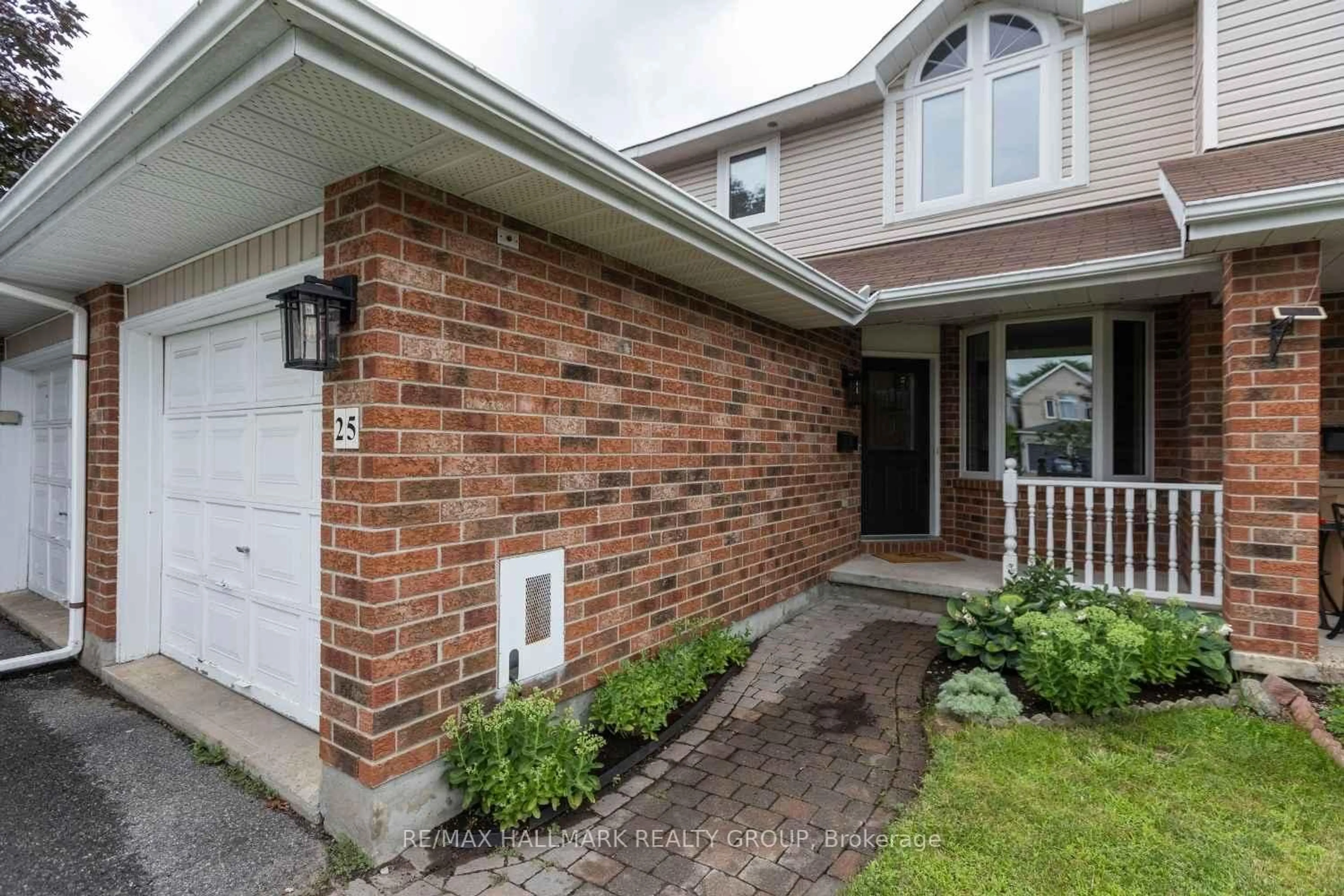 Home with brick exterior material, street for 25 Oriska Way, Nepean Ontario K2J 4N7