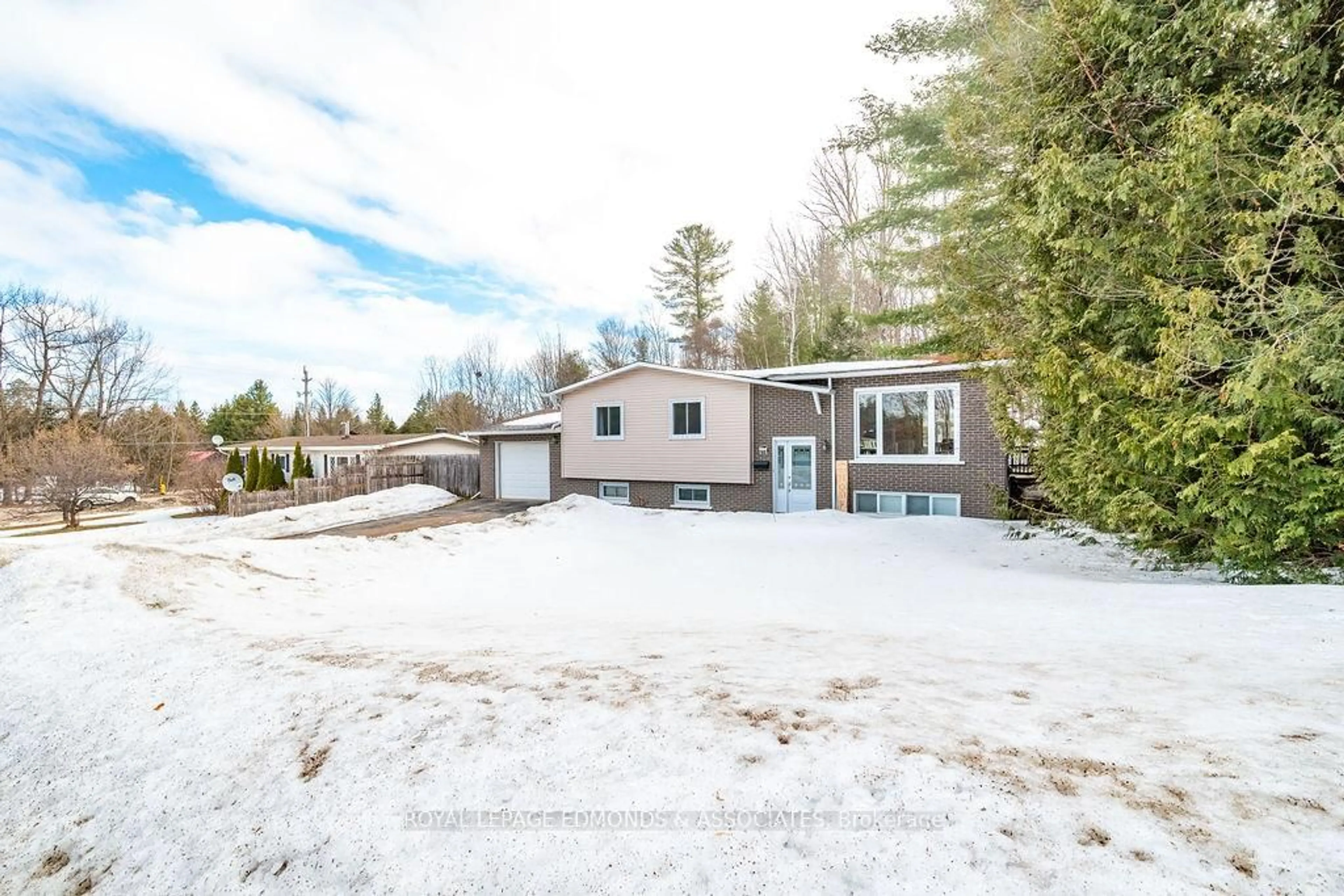 A pic from outside/outdoor area/front of a property/back of a property/a pic from drone, unknown for 65 Armstrong Rd, Petawawa Ontario K8H 2S2